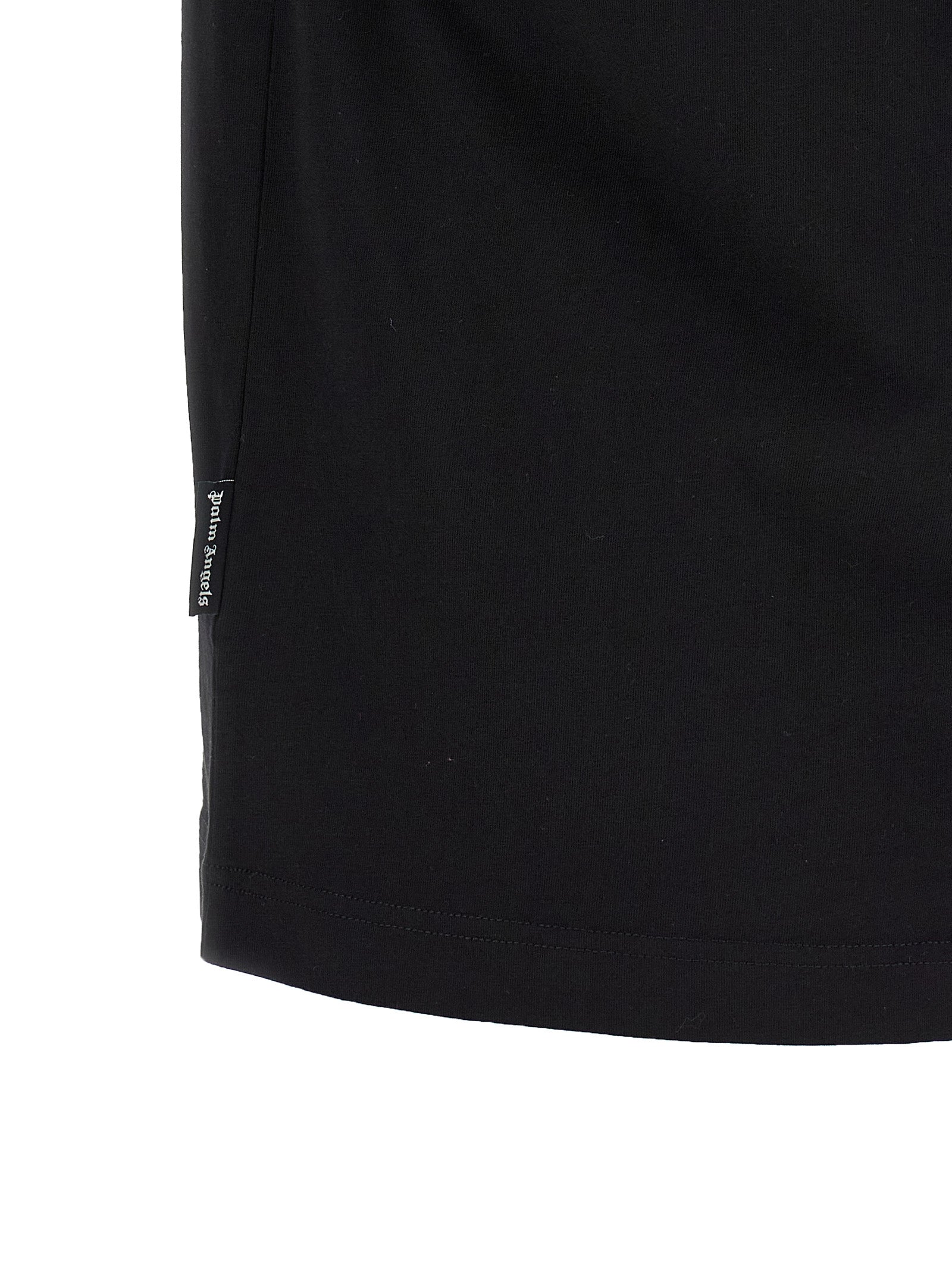 Elevate your wardrobe with the Palm Angels Black Cotton T-Shirt, a masterpiece of 100% cotton, blending urban elegance with artisanal craftsmanship for the discerning individual.