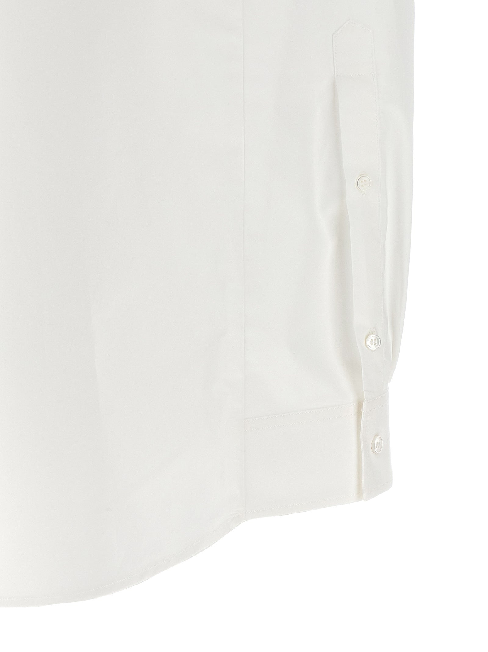 Discover the MM6 Maison Margiela White Cotton Blouse, a masterpiece of minimalist elegance and avant-garde sophistication, perfect for the discerning wardrobe.