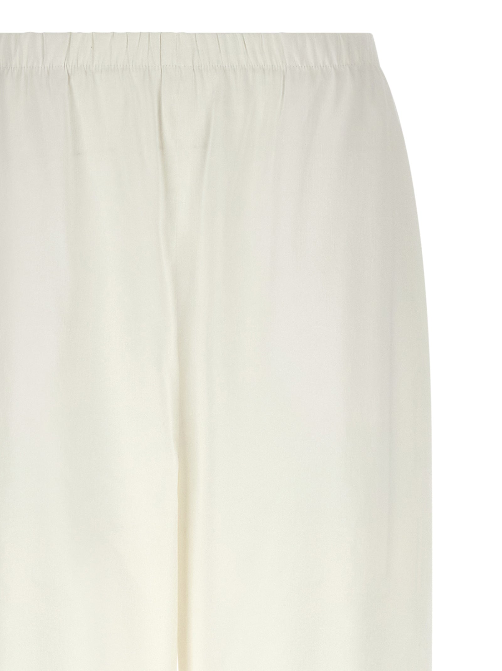 Elevate your wardrobe with Max Mara's White Linen Casual Pants, a luxurious blend of linen and viscose, designed for effortless sophistication and timeless style.