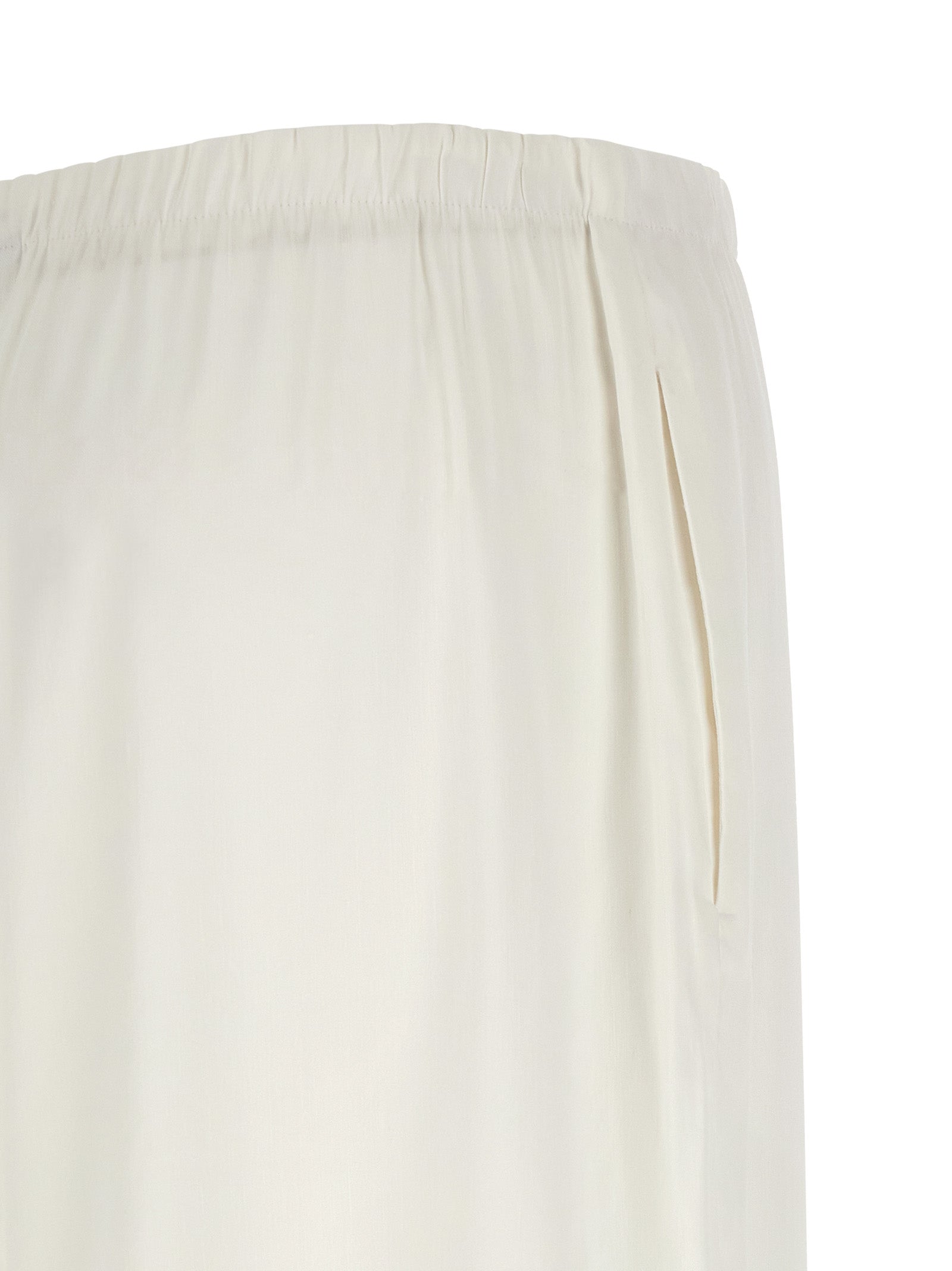 Discover the Max Mara White Linen Casual Pants, where exquisite craftsmanship meets luxurious comfort, perfect for elevating your style with effortless sophistication.