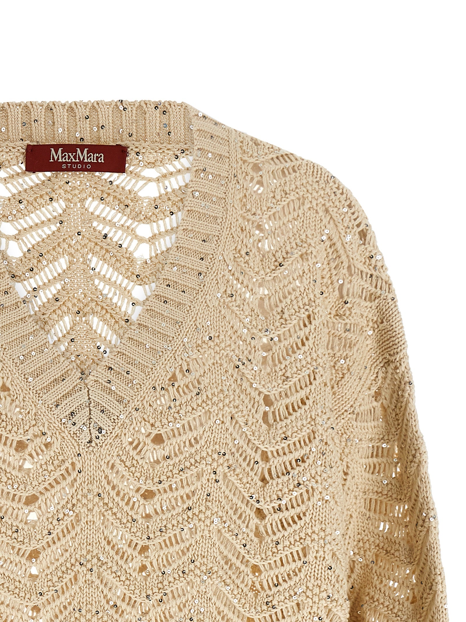 Elevate your wardrobe with the Max Mara Beige Cotton Cardigan from the MstFelino collection, featuring exquisite Chevron stitching and micro sequins for timeless sophistication.