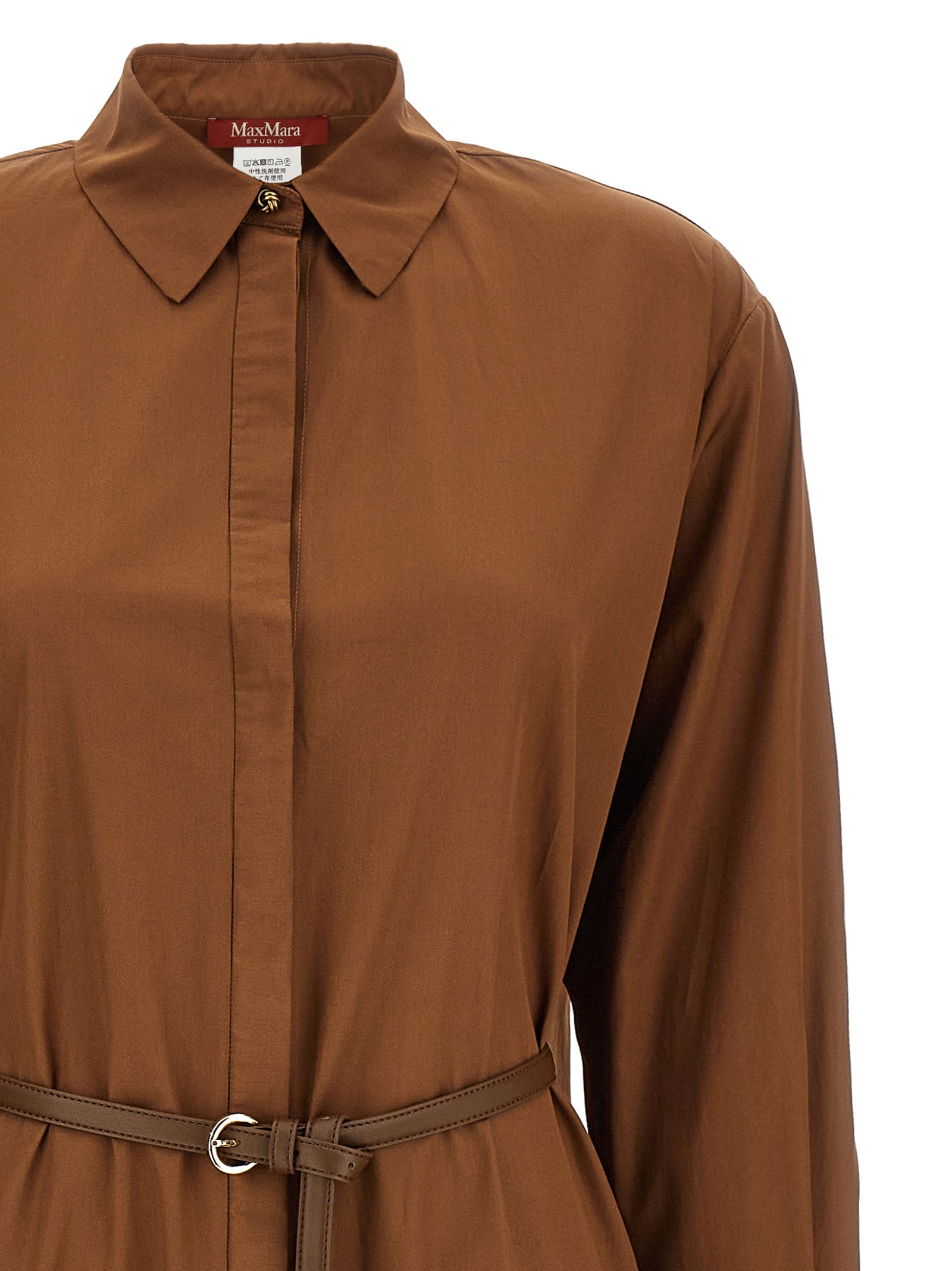 Experience the artisanal elegance of the Max Mara Brown Cotton Long Dress, a timeless masterpiece crafted from 100% cotton, perfect for sophisticated occasions.