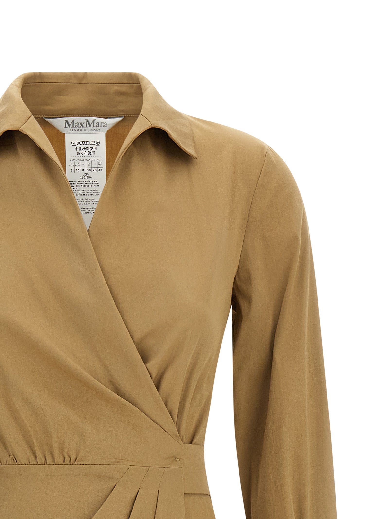 Indulge in the Max Mara Beige Cotton Midi Dress, a masterpiece of luxurious cotton poplin, designed for those who embody elegance and sophistication in every moment.
