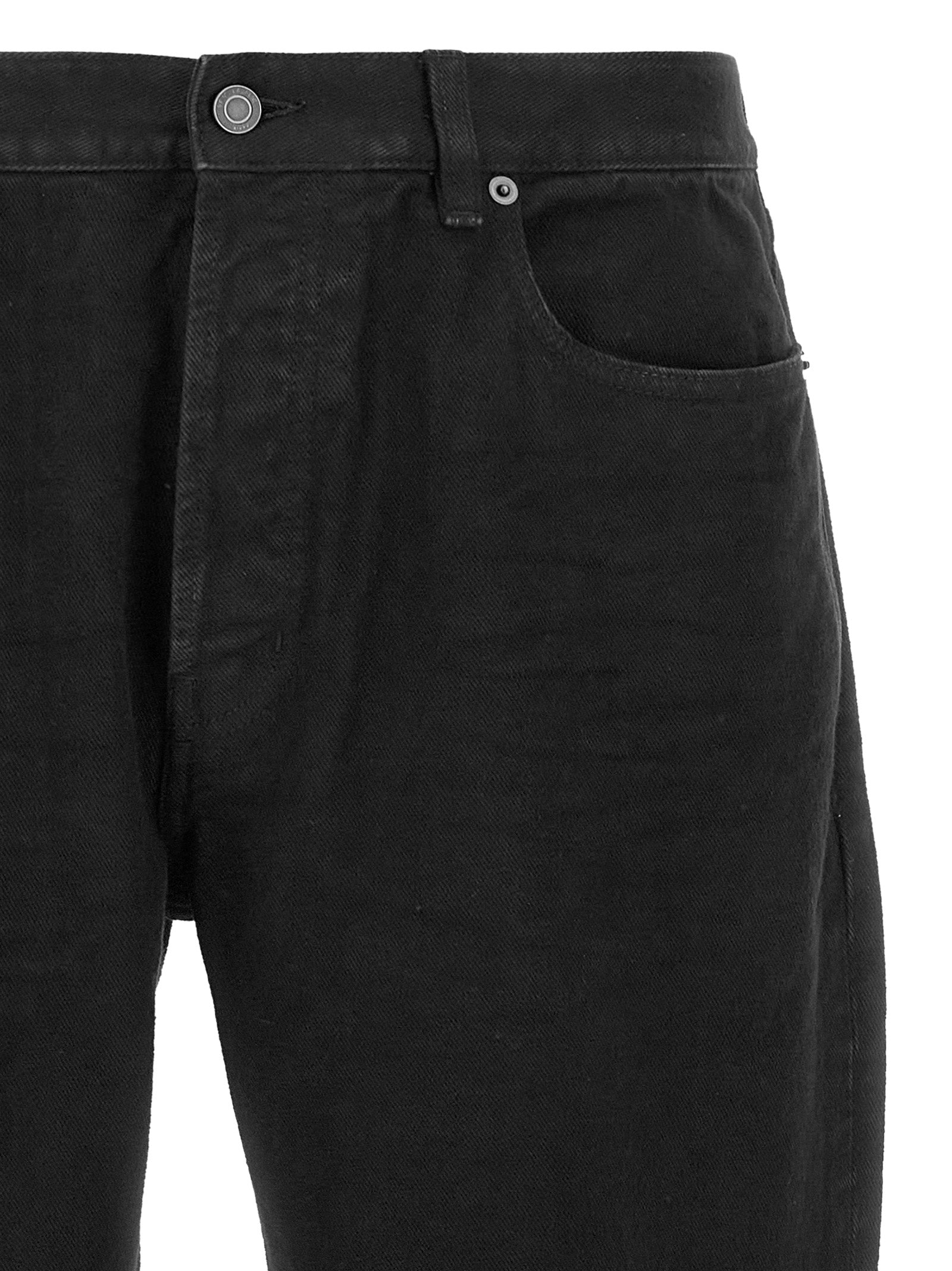 Indulge in the exquisite Saint Laurent Black Cotton Straight-Leg Jeans, a timeless embodiment of luxury and sophistication, perfect for elevating any wardrobe.