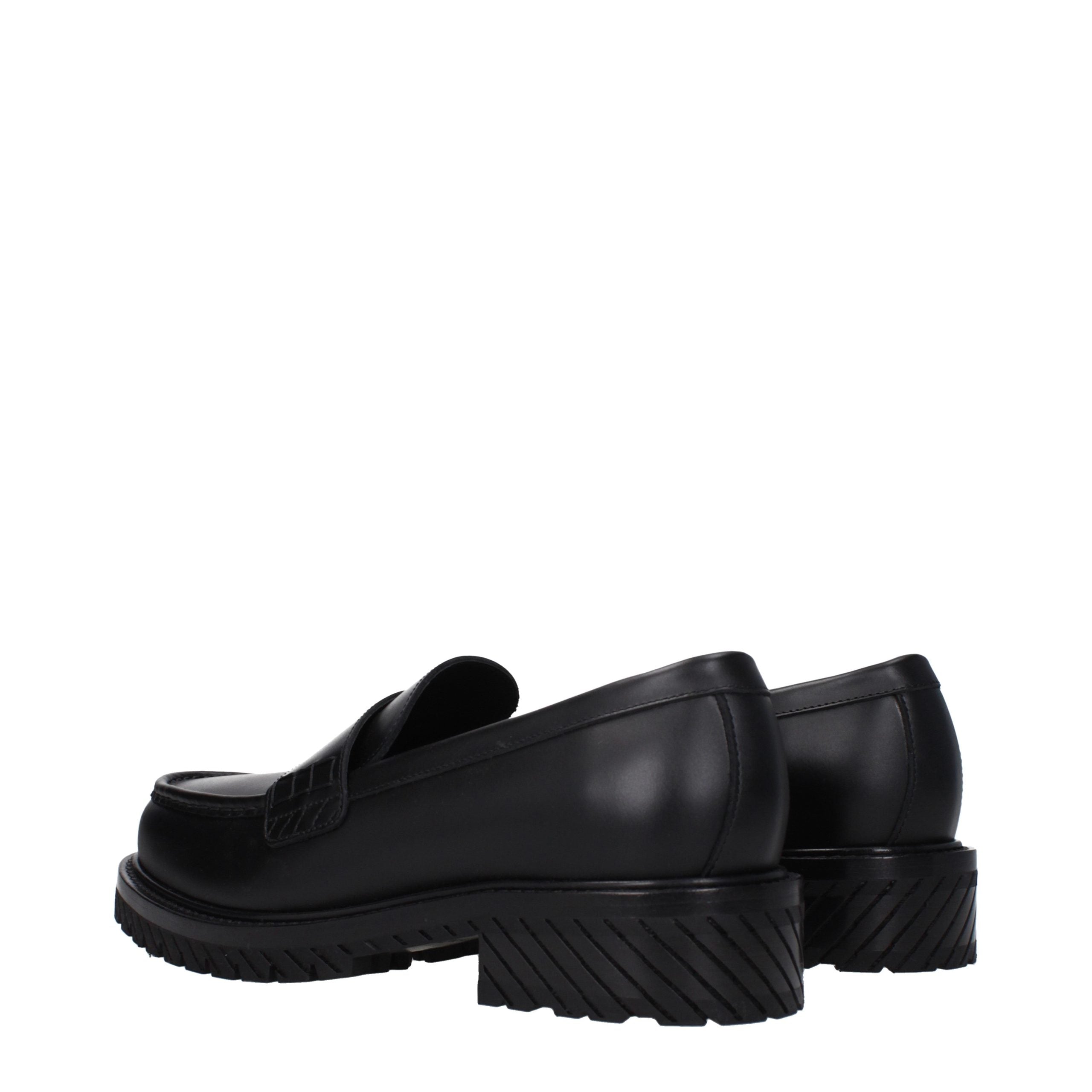 Indulge in the Off-White Black Leather Slip-On Loafers, where exquisite craftsmanship meets timeless elegance, perfect for those who embrace luxury and sophistication.