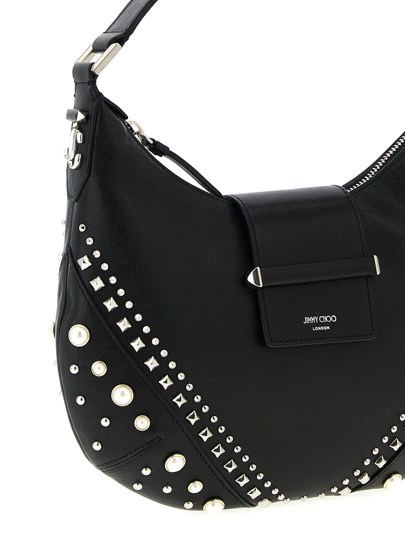 Discover the Jimmy Choo White Lamb Leather Shoulder Bag, a masterpiece of artisanal luxury, crafted from supple lamb leather and adorned with exquisite embellishments.