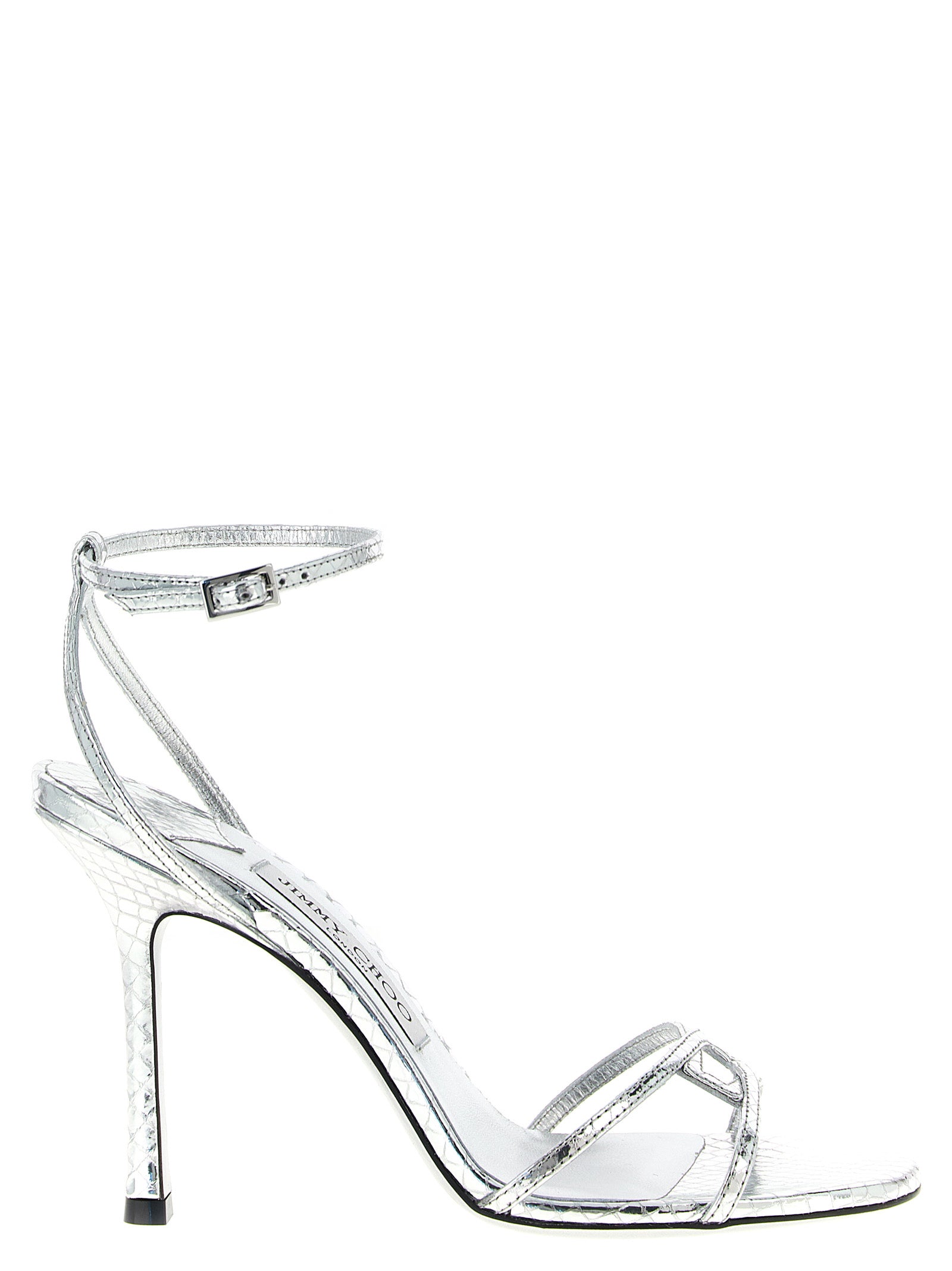 Elevate your elegance with Jimmy Choo's Silver Leather Stiletto Heel Sandals, a 1998 masterpiece crafted in Italy, blending luxurious materials for timeless allure.