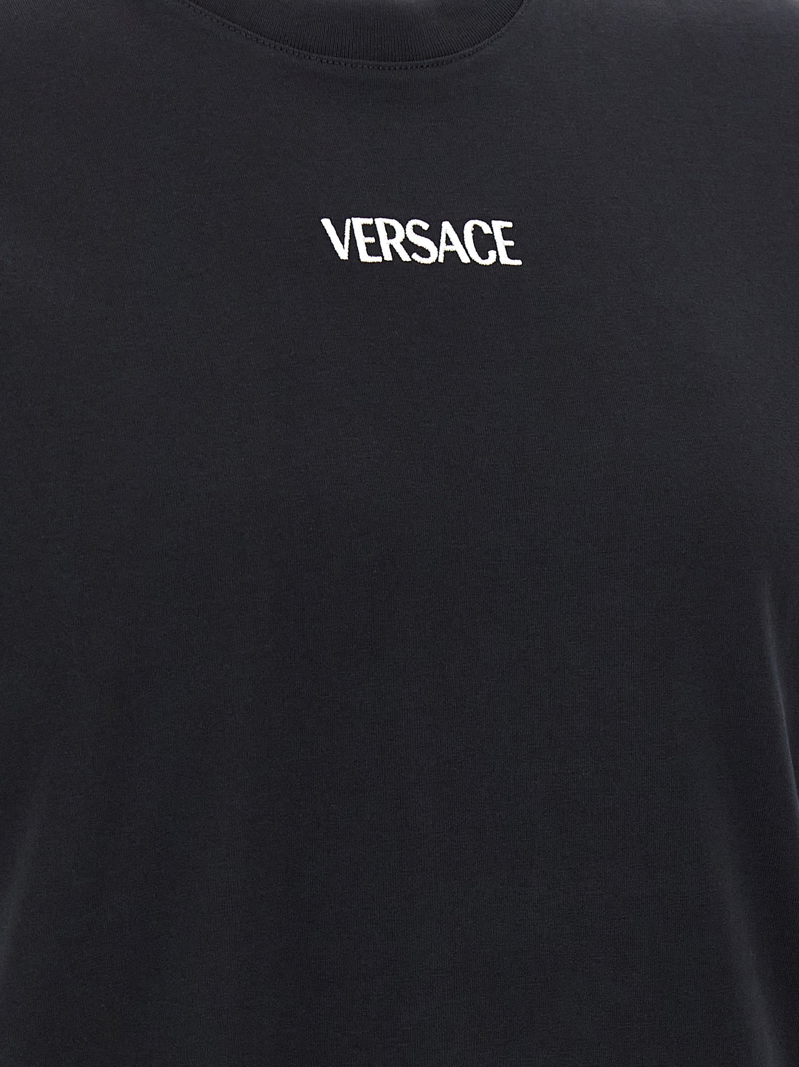 Elevate your style with the Versace Black Cotton T-Shirt, a luxurious blend of comfort and sophistication, perfect for the discerning trendsetter.