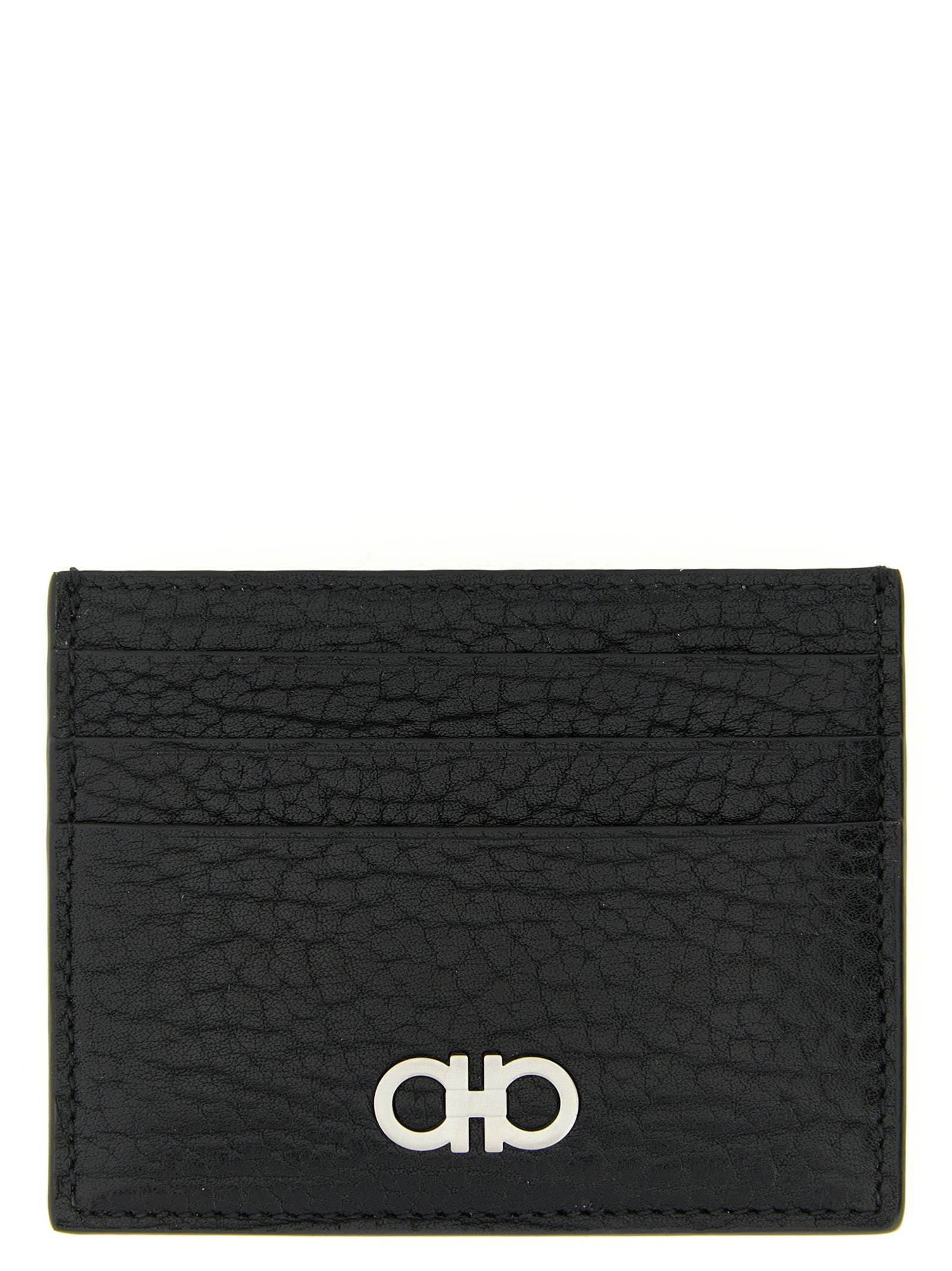 Experience the allure of the Ferragamo Black Calfskin Cardholder, a testament to Italian craftsmanship, where luxury meets functionality for the discerning individual.