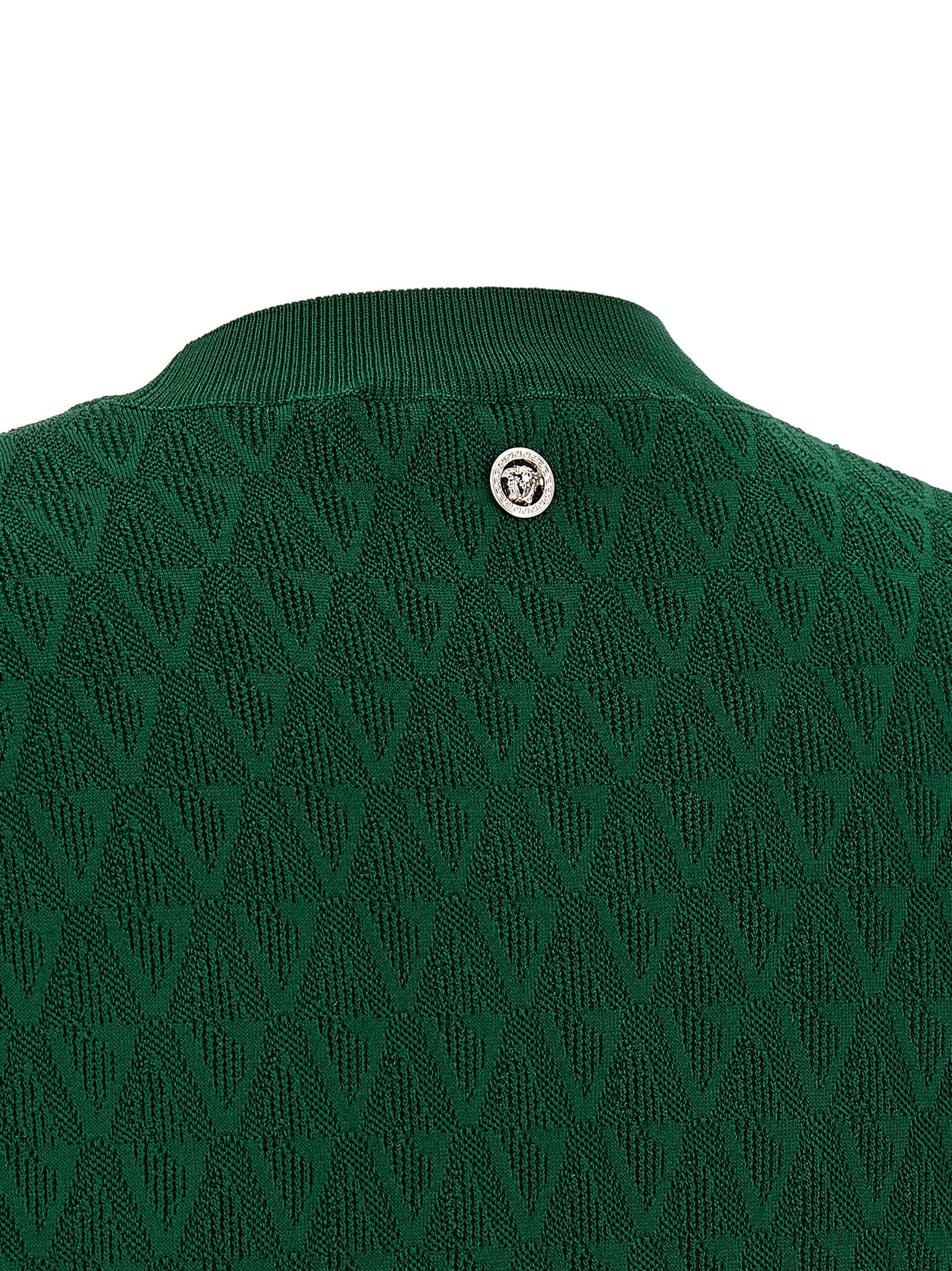 Indulge in the Versace Bicolor Viscose T-Shirt, a luxurious blend of stretch viscose and jacquard artistry, embodying elegance and sophistication for the discerning individual.