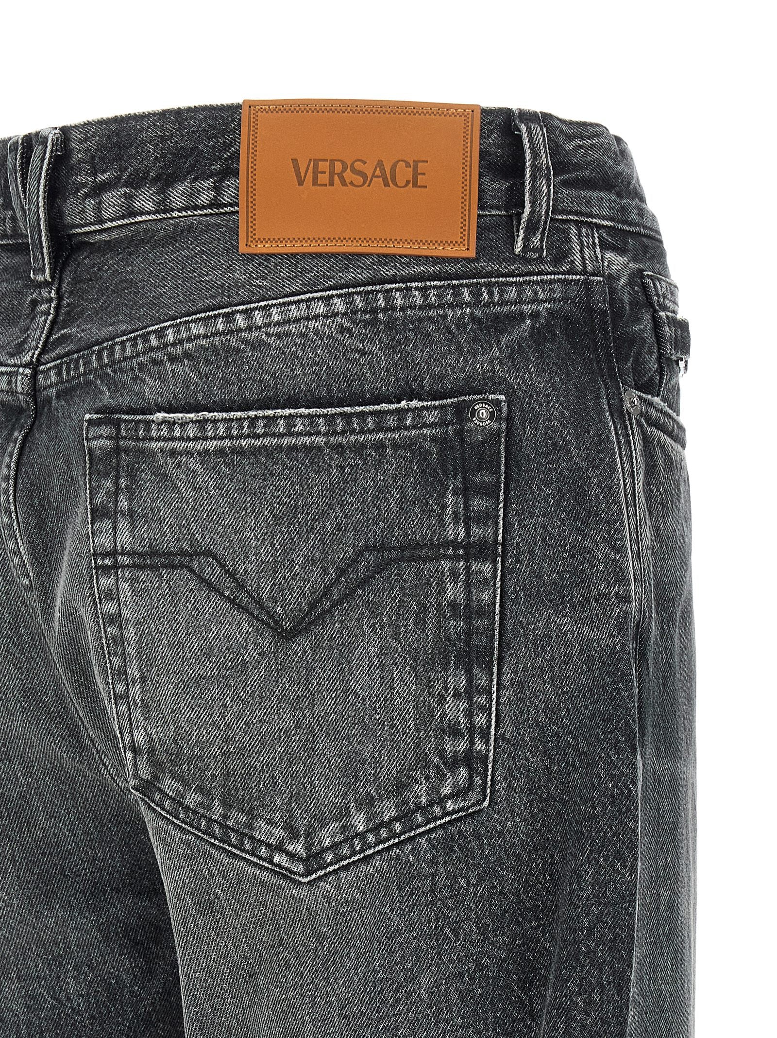 Experience the allure of Versace Gray Cotton Straight-Leg Jeans, where artisanal luxury meets timeless elegance in exquisite stonewashed denim.