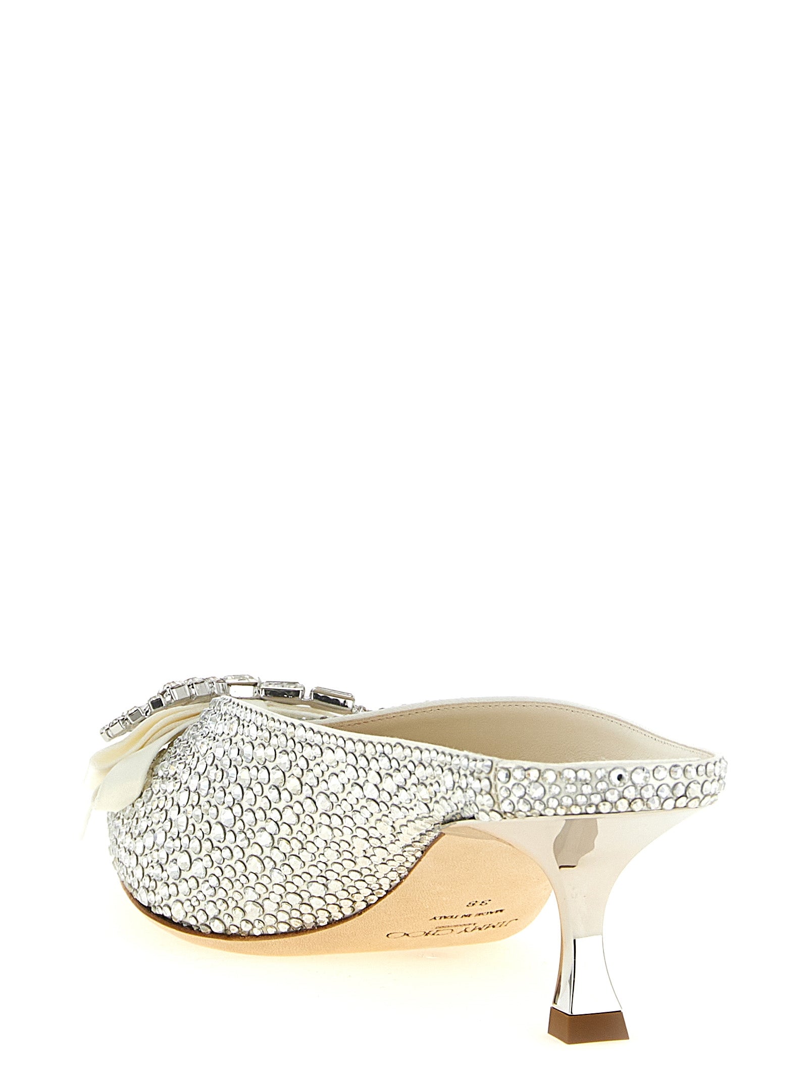 Experience the exquisite allure of Jimmy Choo Silver Tencel Mid Heel Pumps, where artisanal craftsmanship meets timeless elegance, perfect for unforgettable moments.