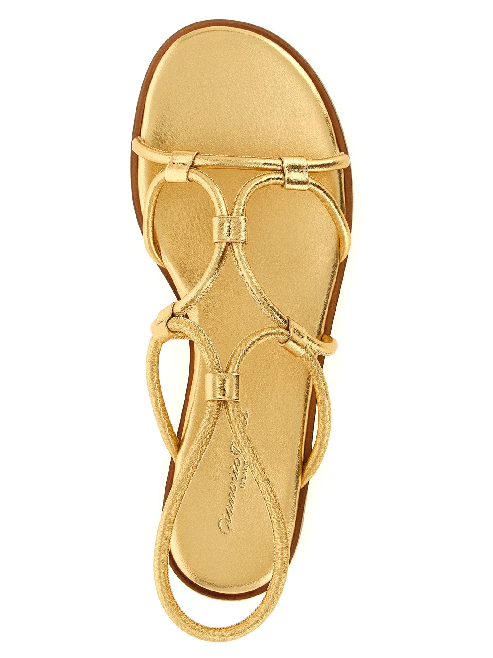 Experience the allure of Gianvito Rossi's gold lamb leather flat sandals, where Italian craftsmanship meets sophisticated elegance, perfect for the discerning individual.