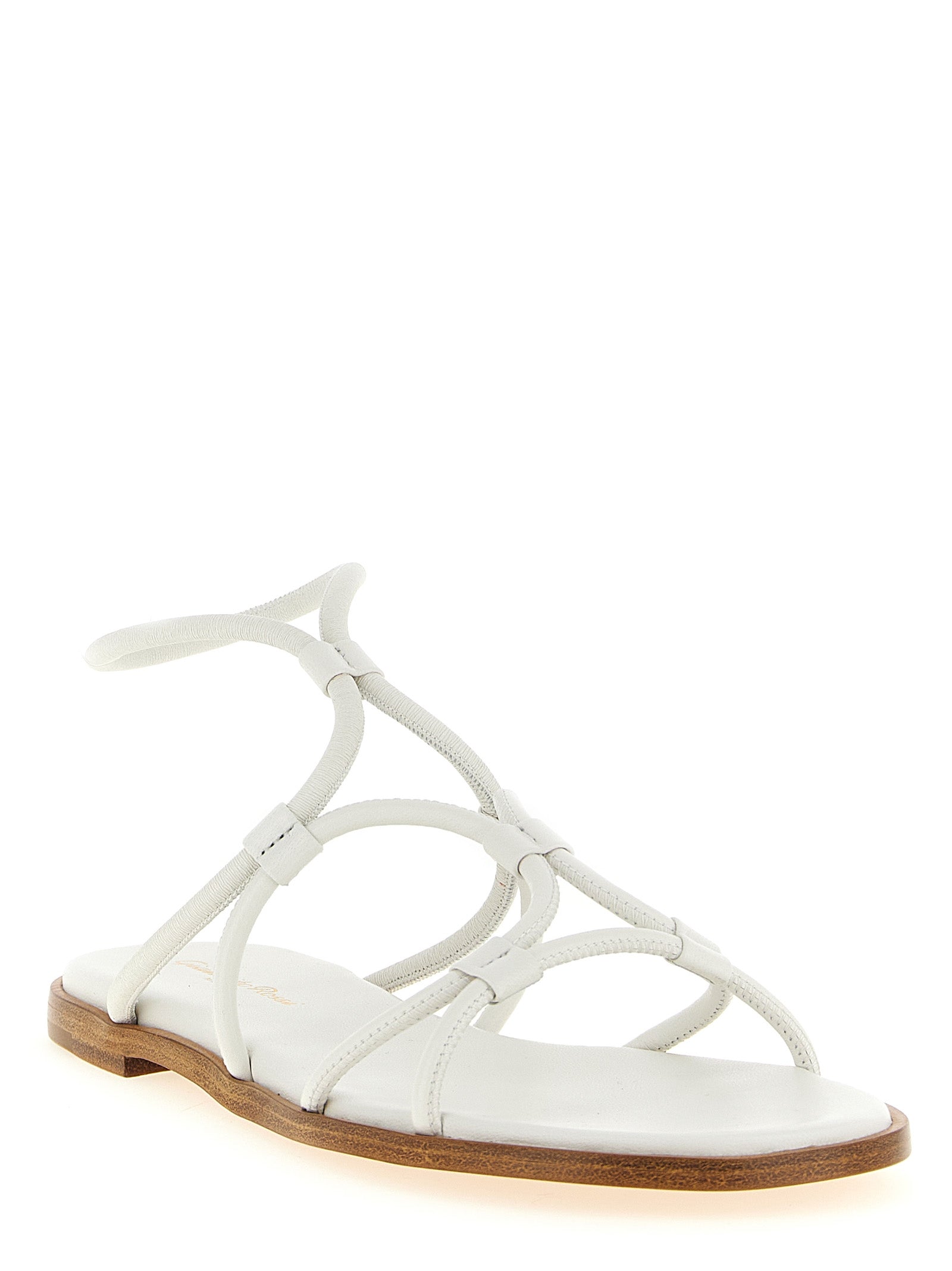 Step into a world of elegance with Gianvito Rossi's White Lamb Leather Flat Sandals, where exquisite Italian craftsmanship meets timeless sophistication for the discerning individual.