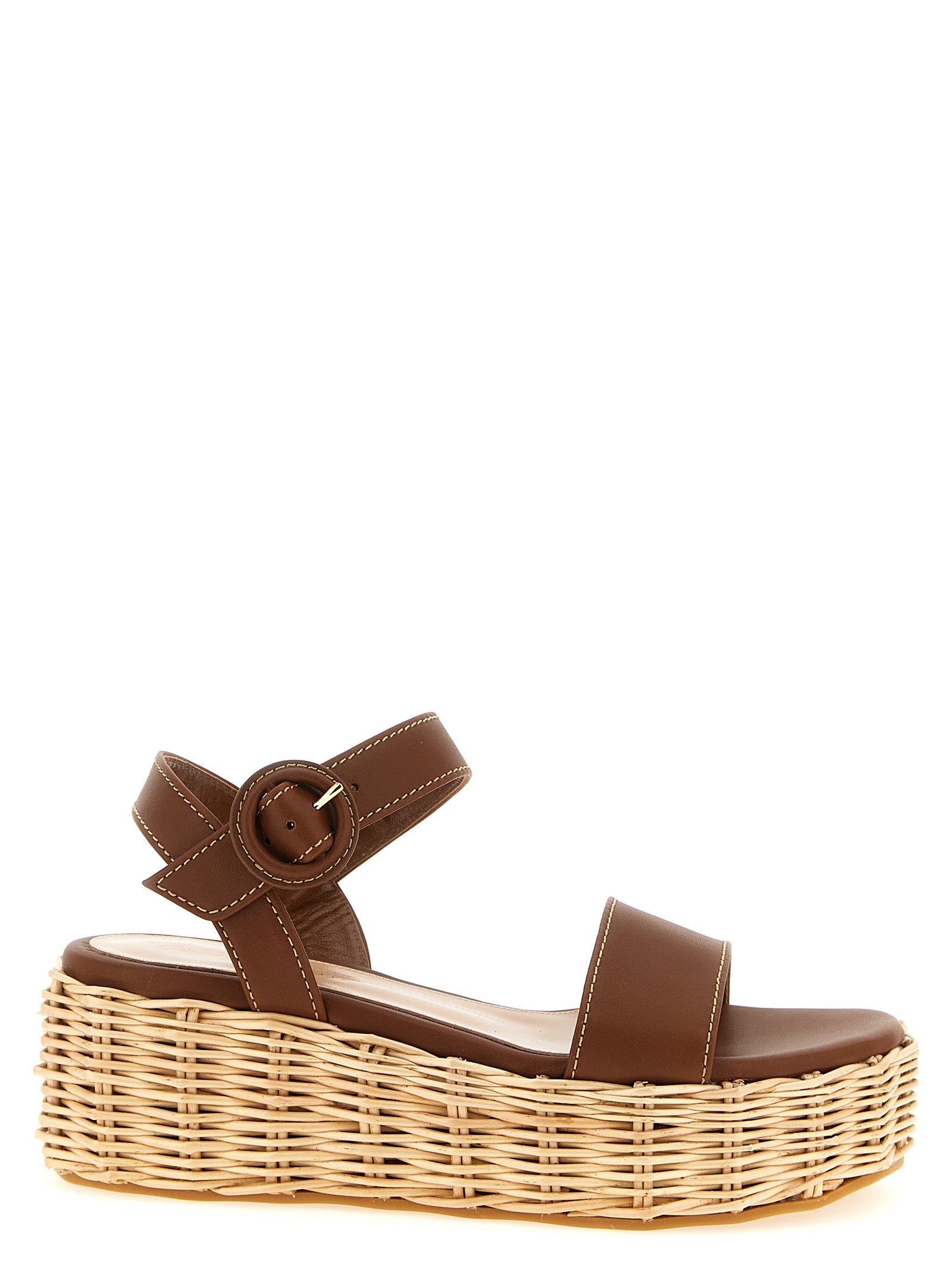 Experience the allure of Gianvito Rossi's Brown Calfskin Wedge Sandals, where Italian craftsmanship meets luxurious elegance, perfect for the discerning connoisseur.