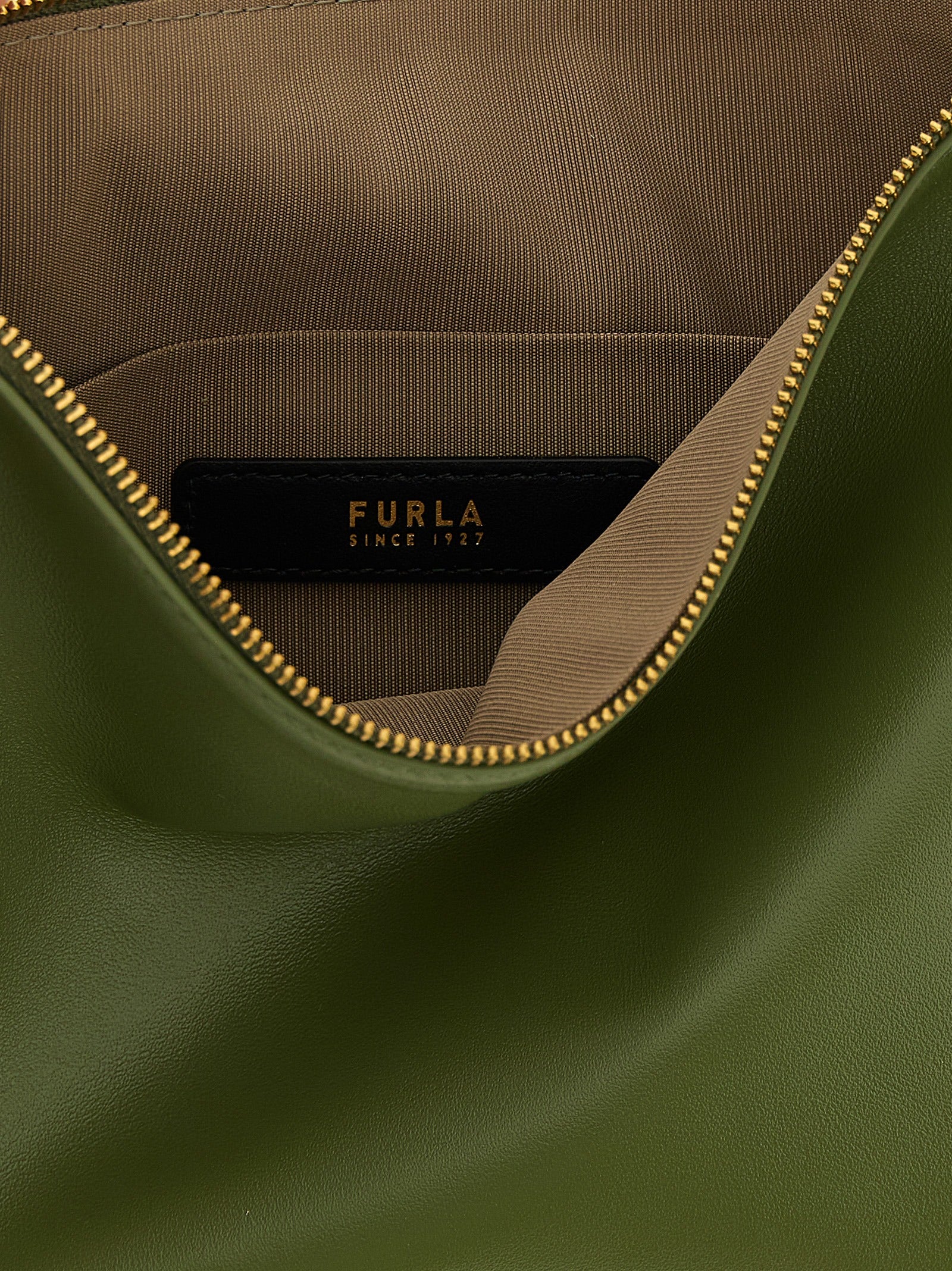 Indulge in the exquisite Furla Bicolor Lamb Leather Shoulder Bag, where artisanal craftsmanship meets luxurious allure, perfect for elevating your style with sophistication.