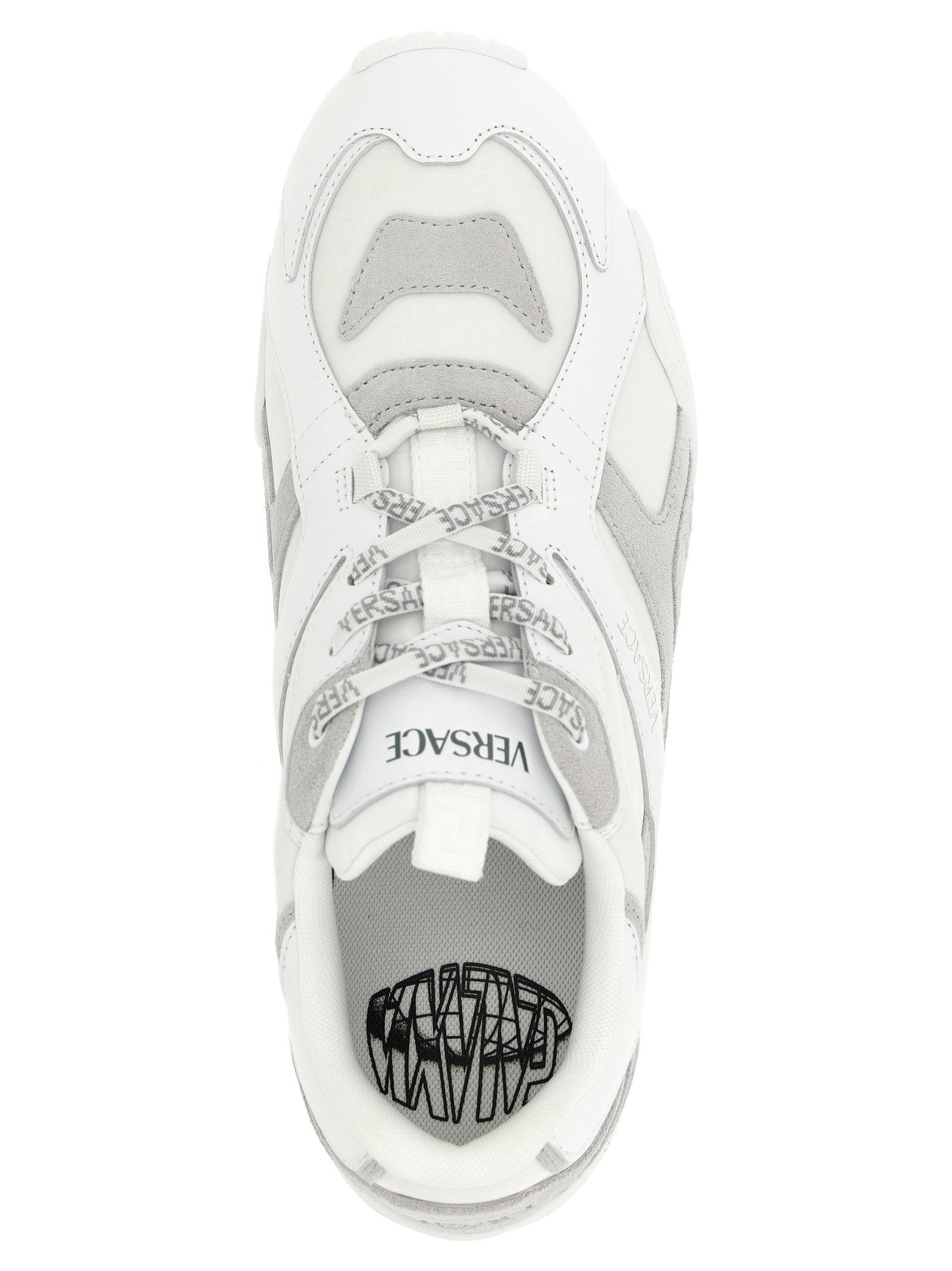 Experience the epitome of luxury with Versace White Calfskin Athletic Sneakers, crafted from sumptuous calfskin leather for a bold, sophisticated statement.