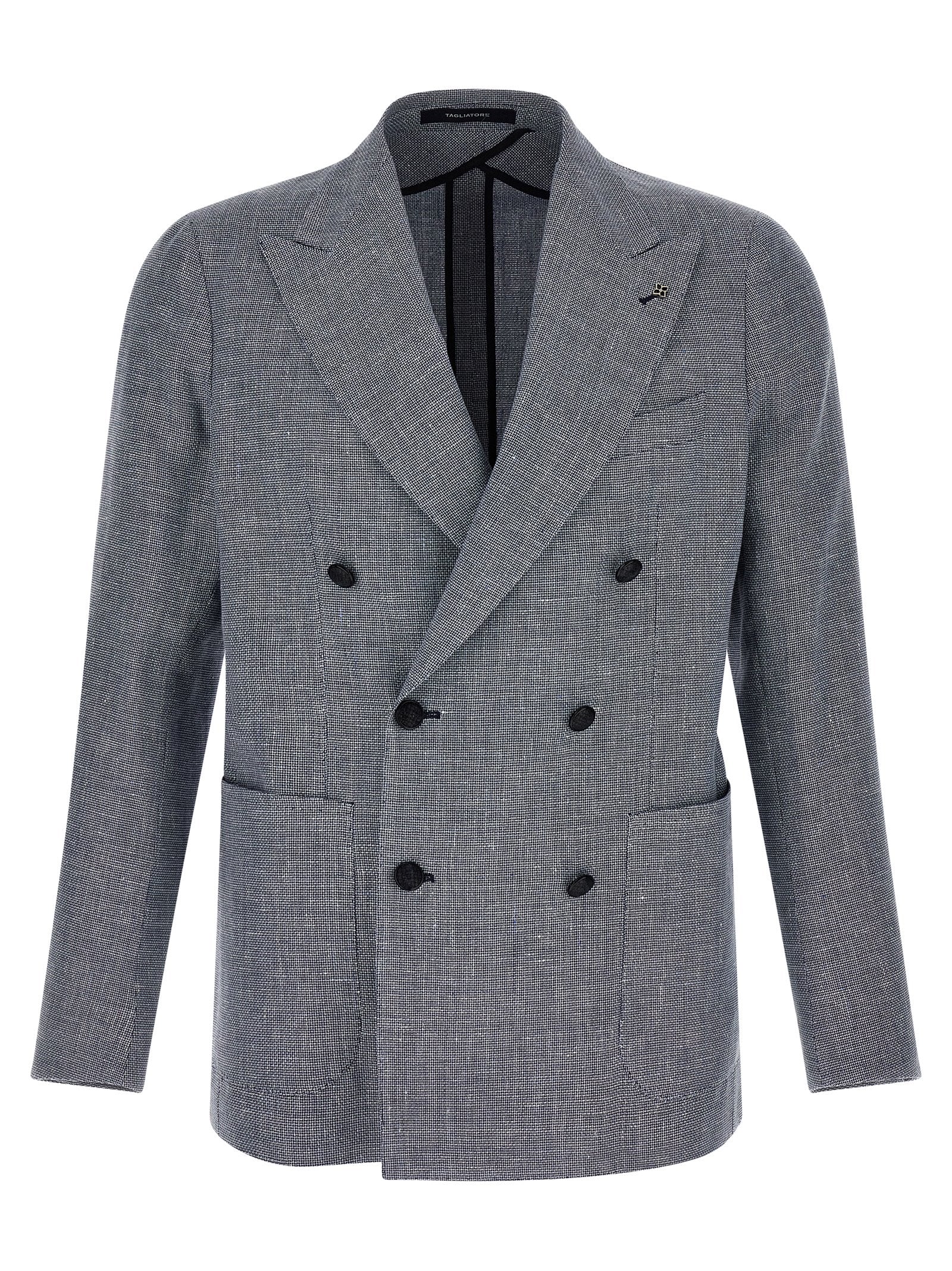 Elevate your wardrobe with the Tagliatore Blue Linen Blazer, a luxurious blend of linen and cotton, embodying Italian craftsmanship and timeless sophistication.