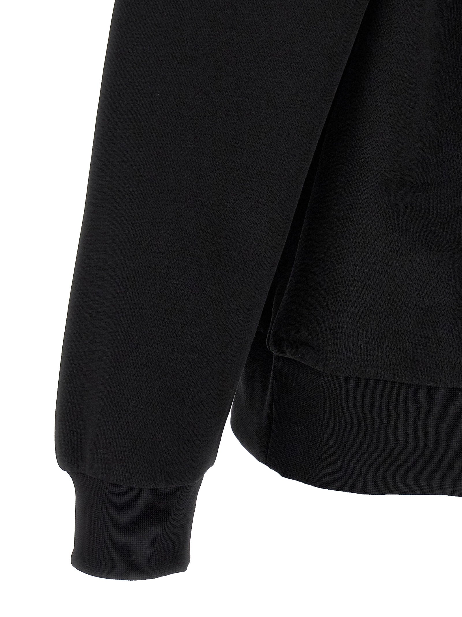 Elevate your wardrobe with the Lacoste Black Cotton Sweatshirt, a luxurious blend of comfort and style, perfect for those who embody sophistication and confidence.