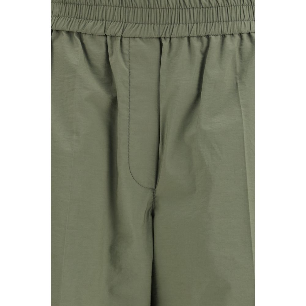 Experience the epitome of luxury with Brunello Cucinelli Bicolor Cotton Casual Pants, where exquisite craftsmanship meets modern elegance for the discerning individual.