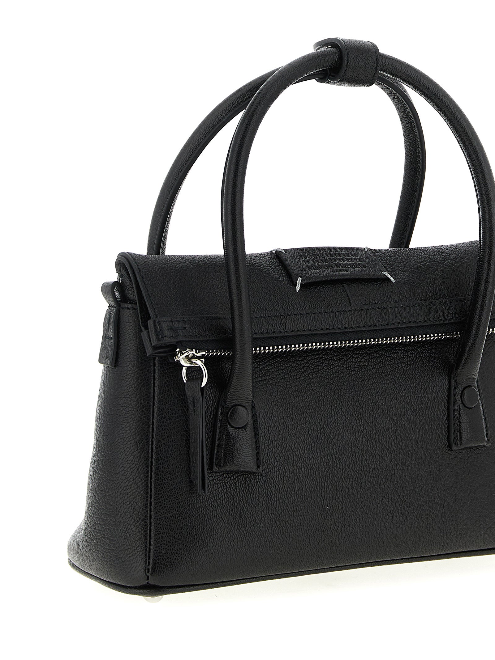 Indulge in the Maison Margiela Black Cashmere Handbag, a timeless luxury crafted from sumptuous hammered leather, embodying sophistication and versatility for the discerning individual.