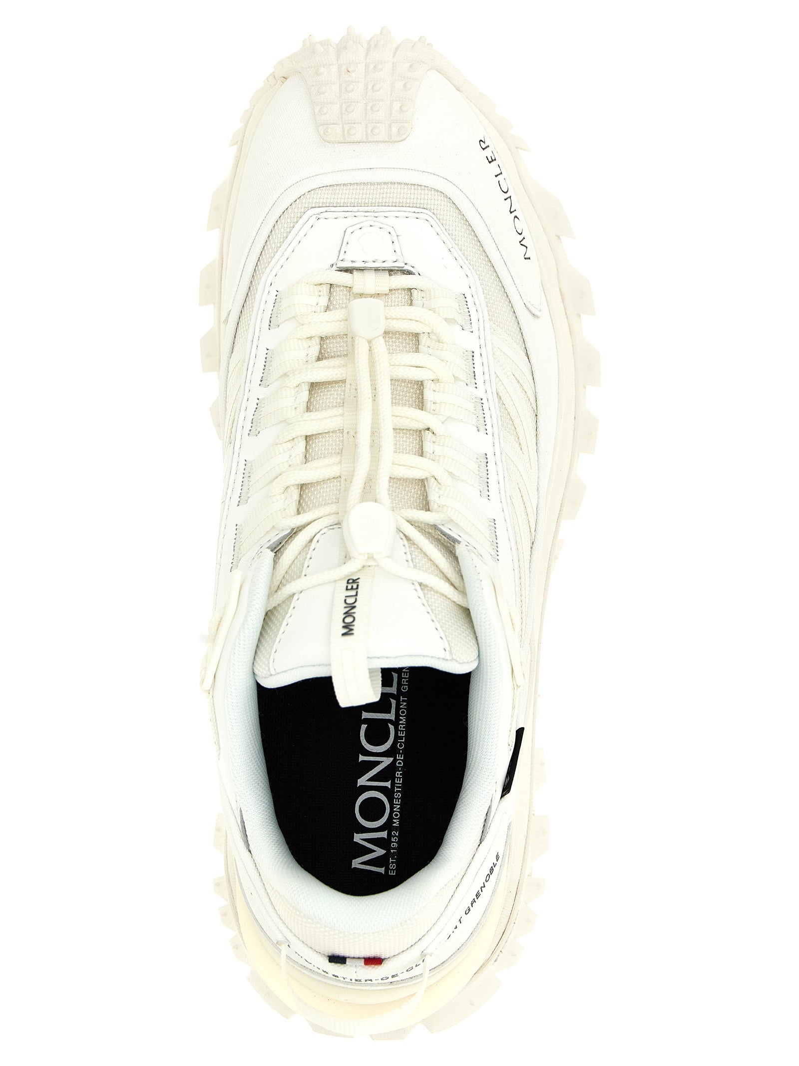 Discover Moncler's Trailgrip GTX sneakers, where premium craftsmanship meets luxurious design, perfect for the discerning adventurer seeking elegance and comfort.