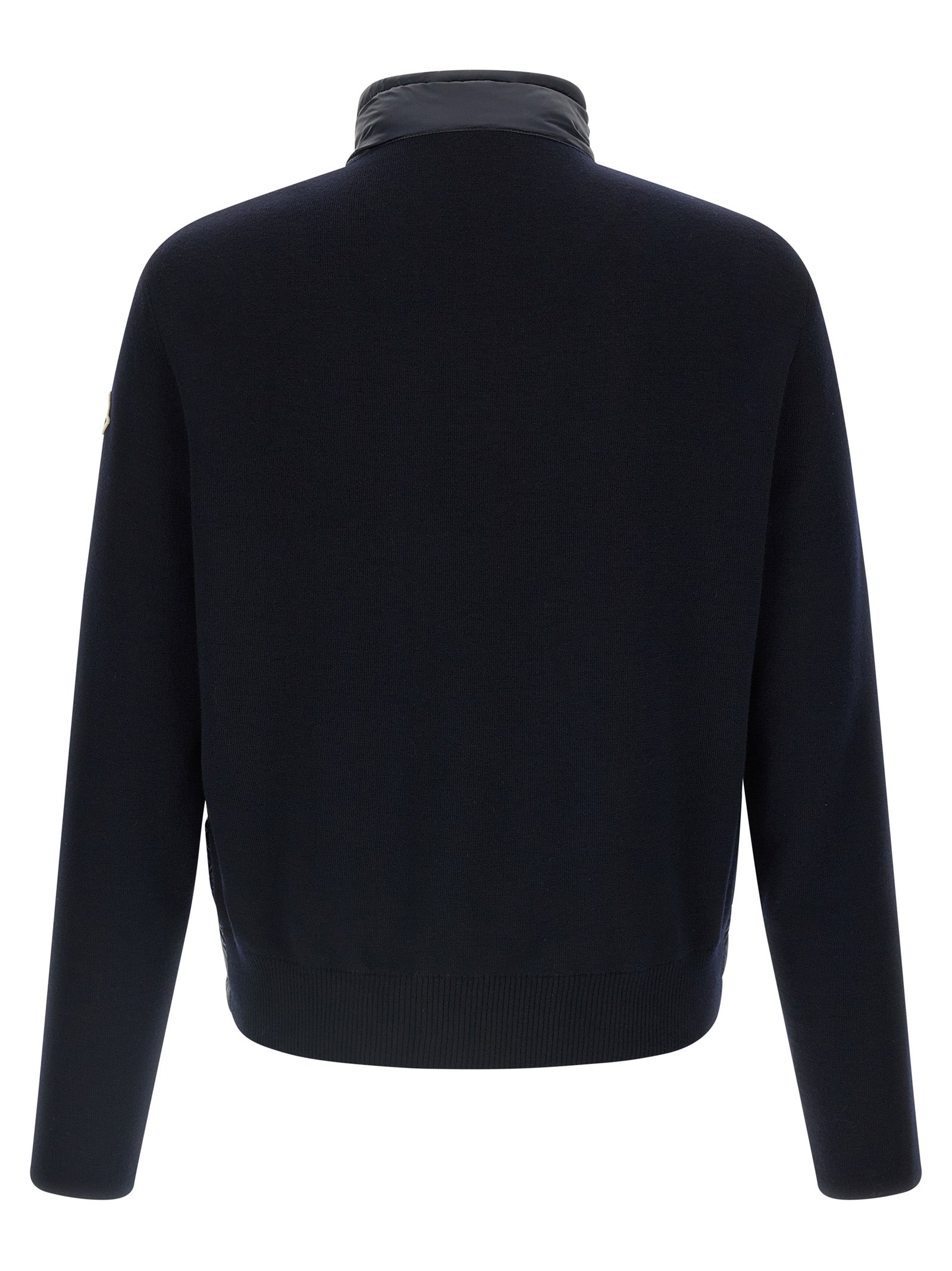 Elevate your style with the Moncler Blue Polyamide Cardigan, a luxurious blend of fine materials and sophisticated design, perfect for the discerning individual.