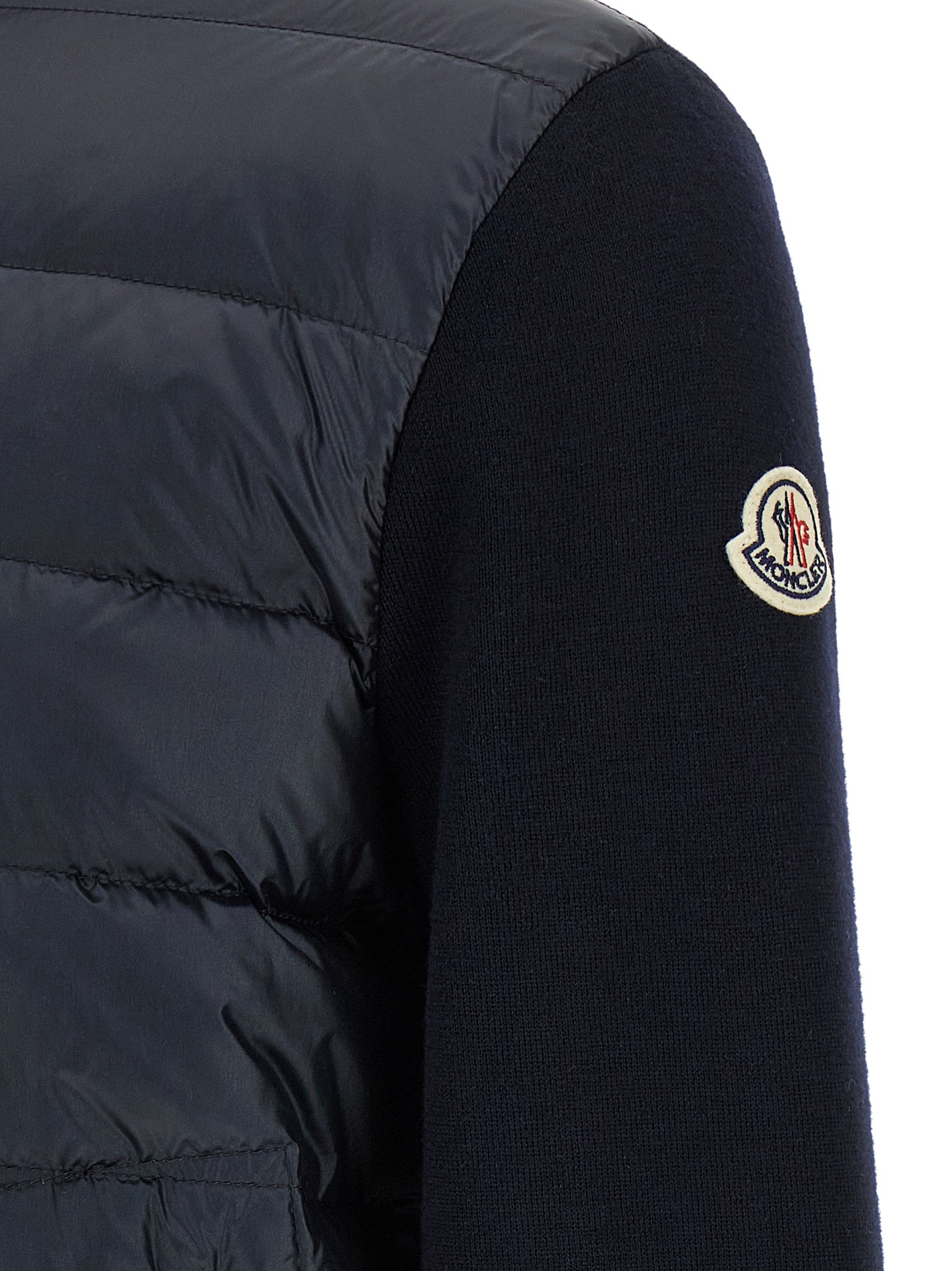 Elevate your style with the Moncler Blue Polyamide Cardigan, a luxurious blend of exquisite materials and sophisticated design, perfect for discerning individuals.