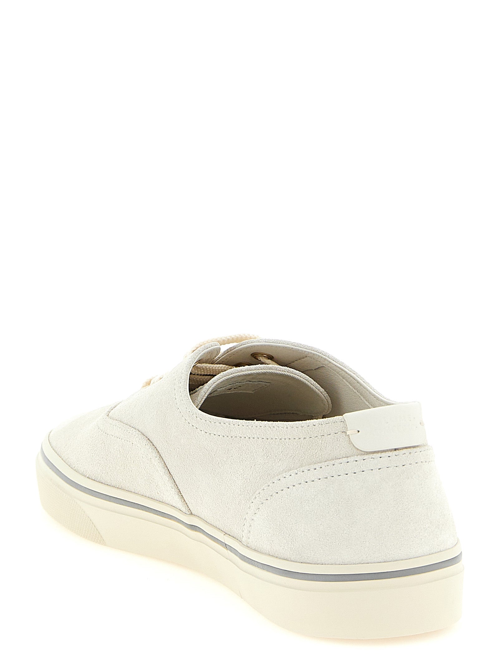 Experience the allure of Brunello Cucinelli's beige calfskin low top sneakers, where Italian craftsmanship meets luxurious elegance, perfect for the discerning individual.