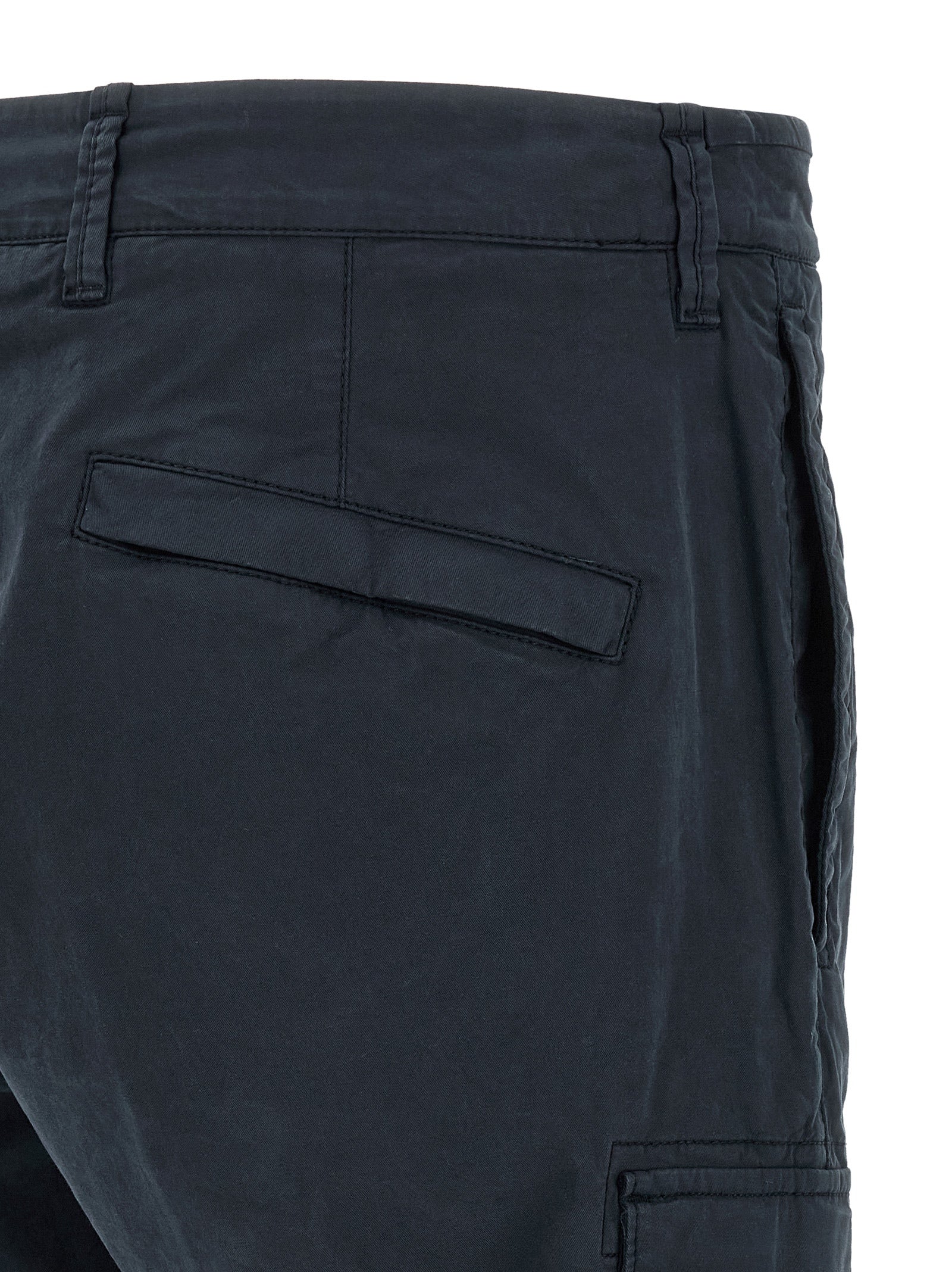 Discover the epitome of sophistication with Stone Island's Blue Cotton Cargo Pants, expertly crafted for those who embrace luxury and style in every moment.
