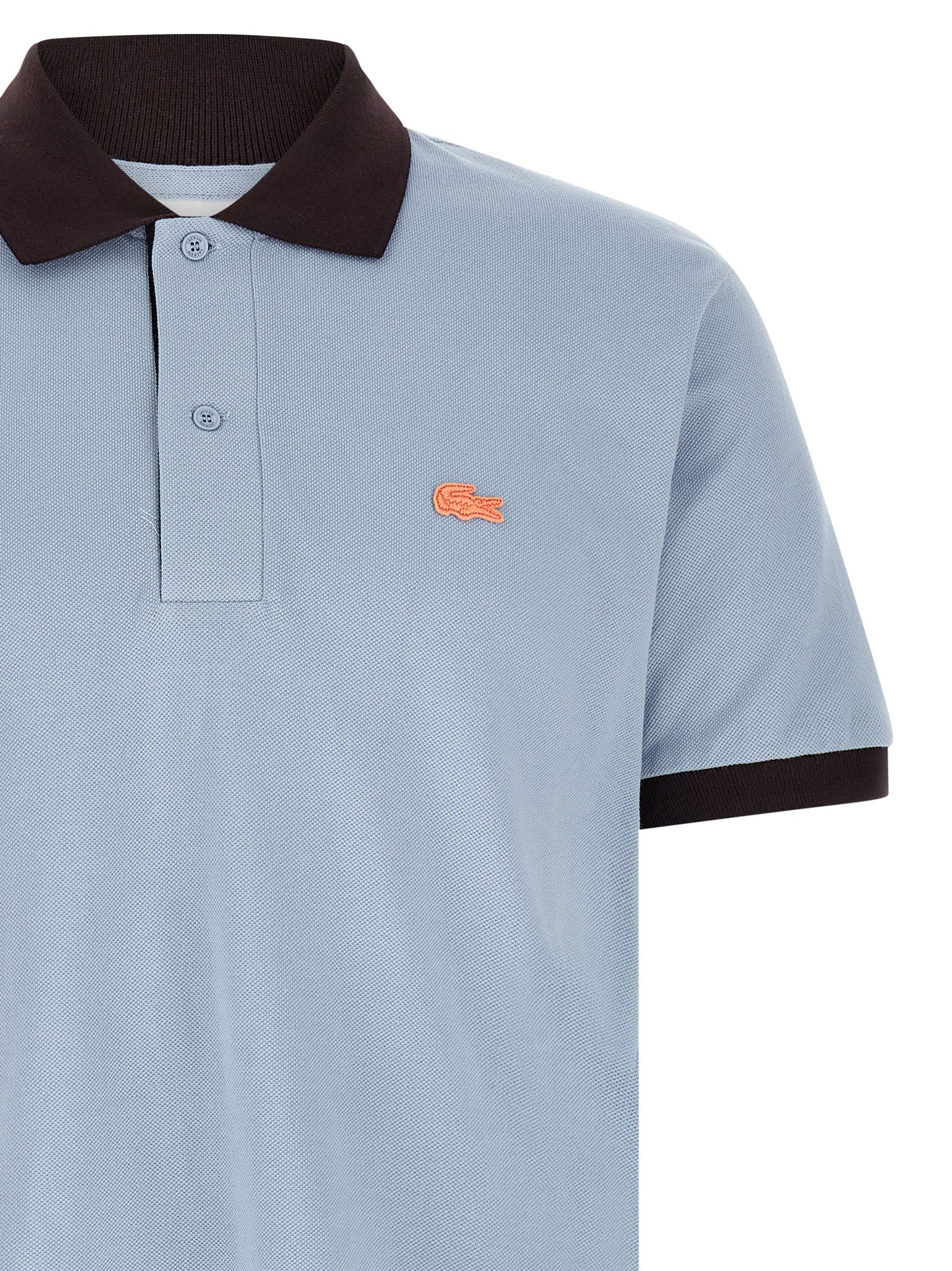Elevate your wardrobe with the Lacoste Blue Cotton Polo Shirt, a timeless blend of luxury and sophistication, crafted for the discerning individual.