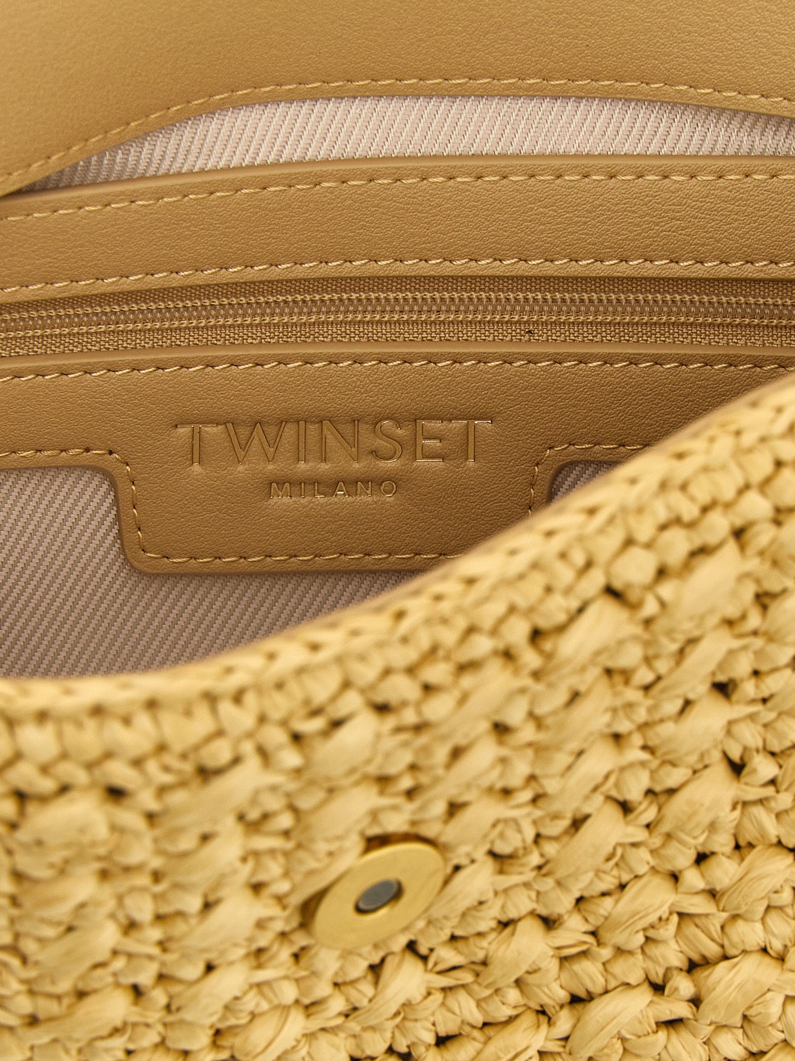 Elevate your style with the Twinset Beige Polypropylene Crossbody Bag, a masterpiece of woven raffia and chic design, perfect for the discerning trendsetter.