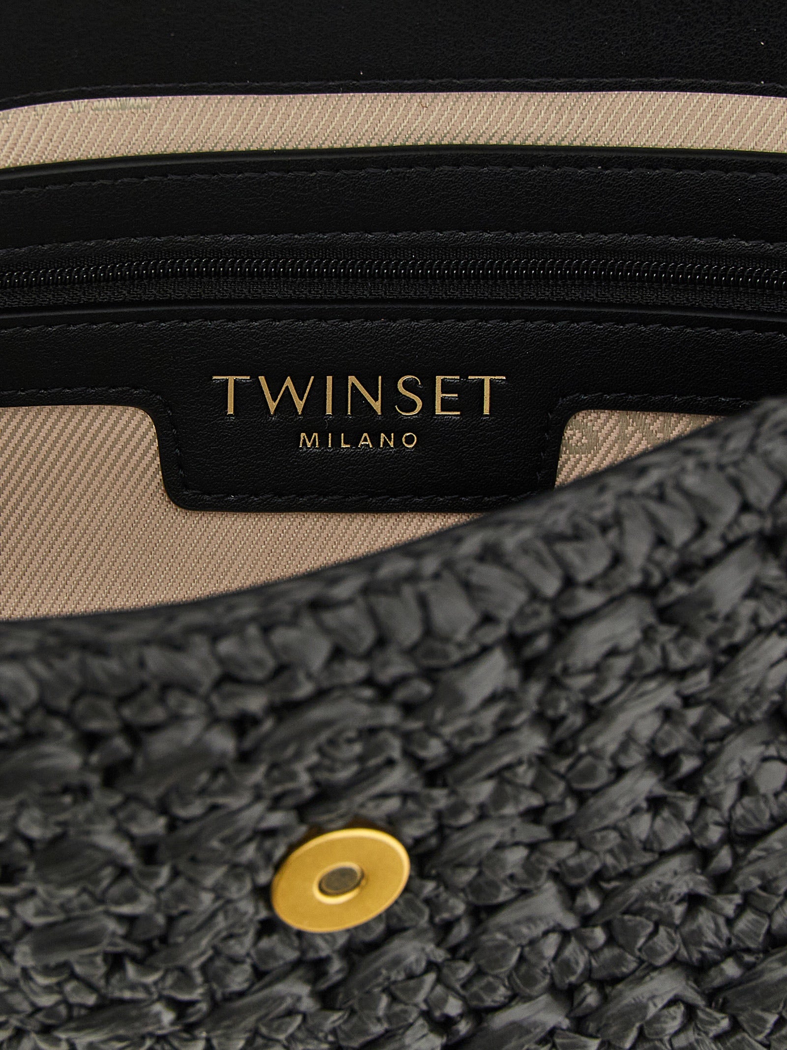 Discover the Twinset Black Polypropylene Crossbody Bag, a masterpiece of craftsmanship and style, perfect for the discerning fashion connoisseur.