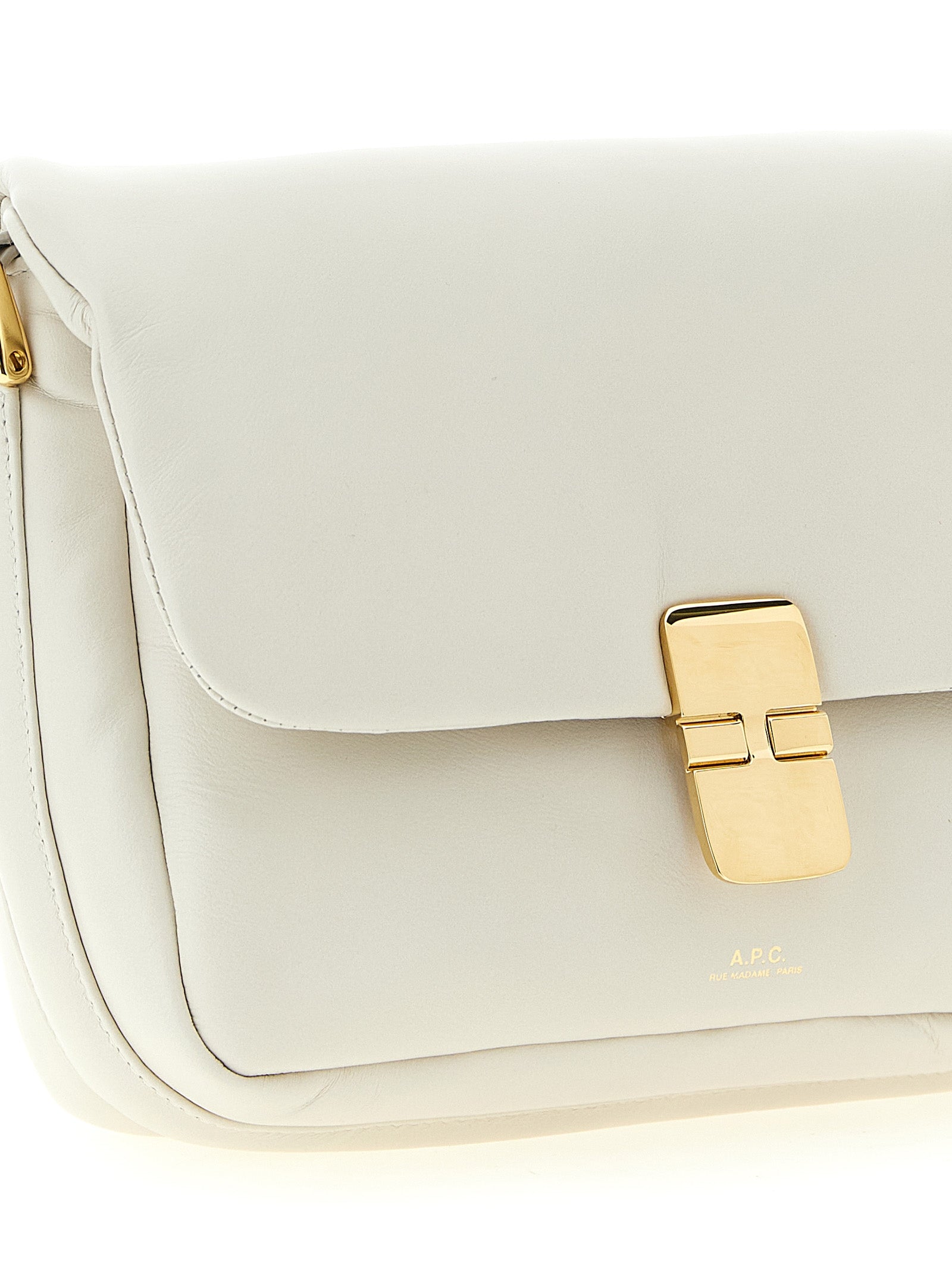 Indulge in the A.P.C. White Cowhide Crossbody Bag, a symbol of modern elegance crafted from sumptuous leather, perfect for elevating any ensemble with luxurious sophistication.