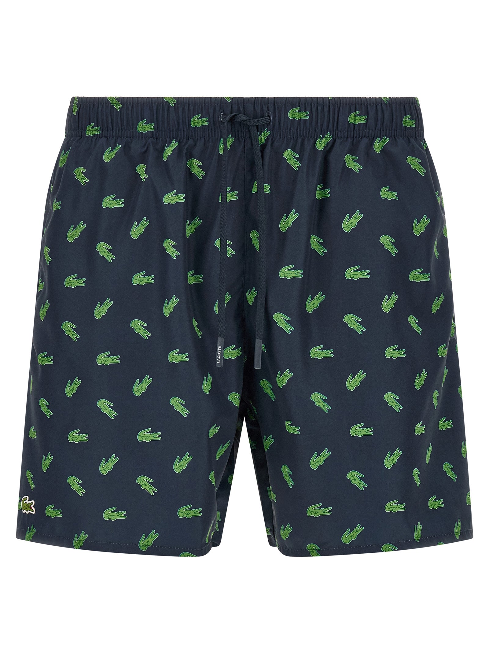 Indulge in the elegance of Lacoste Blue Polyester Swim Shorts, crafted from recycled materials, merging comfort with a bold aesthetic for discerning tastes.