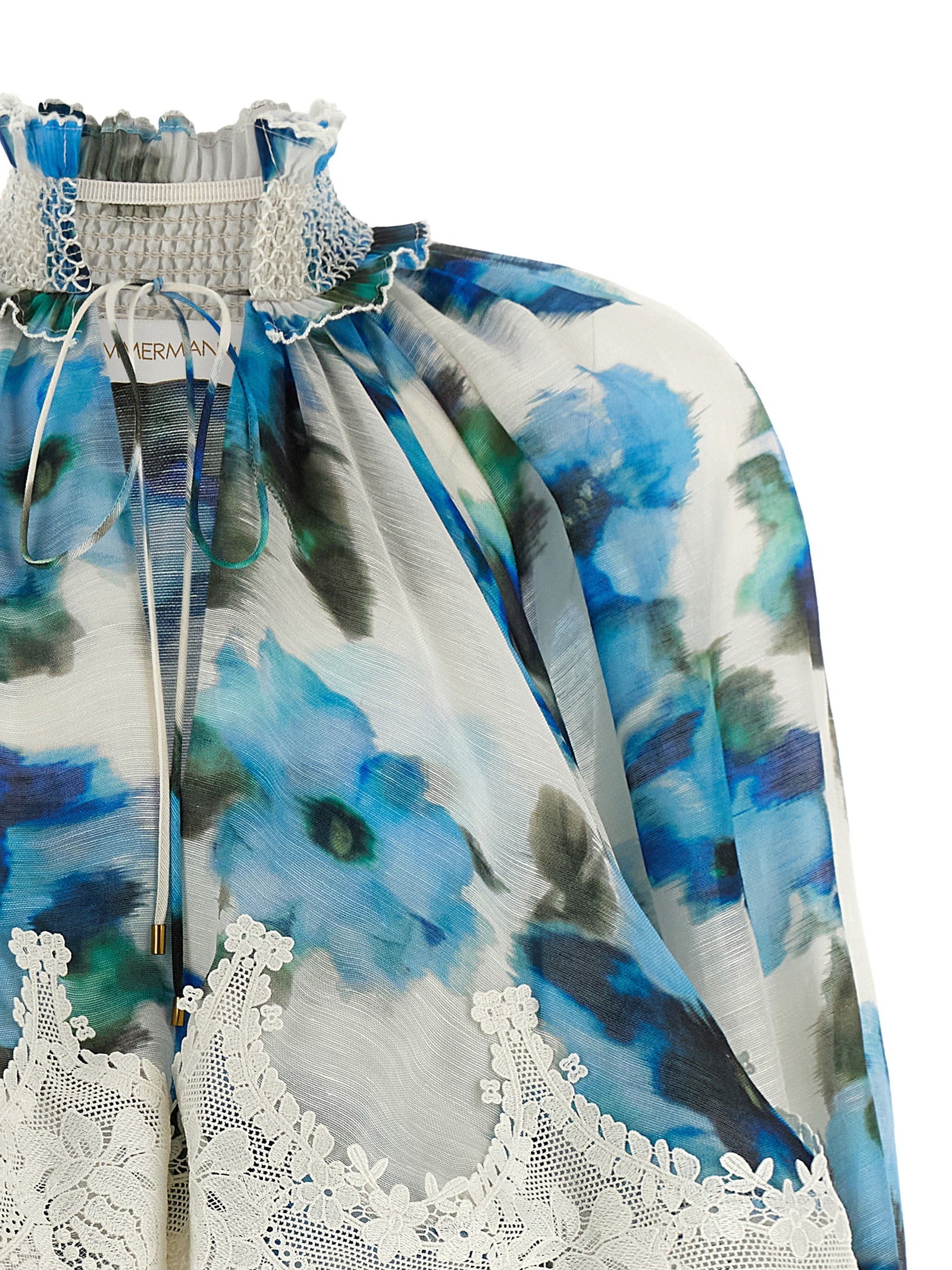 Indulge in the elegance of ZIMMERMANN's Alchemy dress, a silk-linen blend adorned with intricate lace and smock stitching, perfect for the discerning fashion connoisseur.