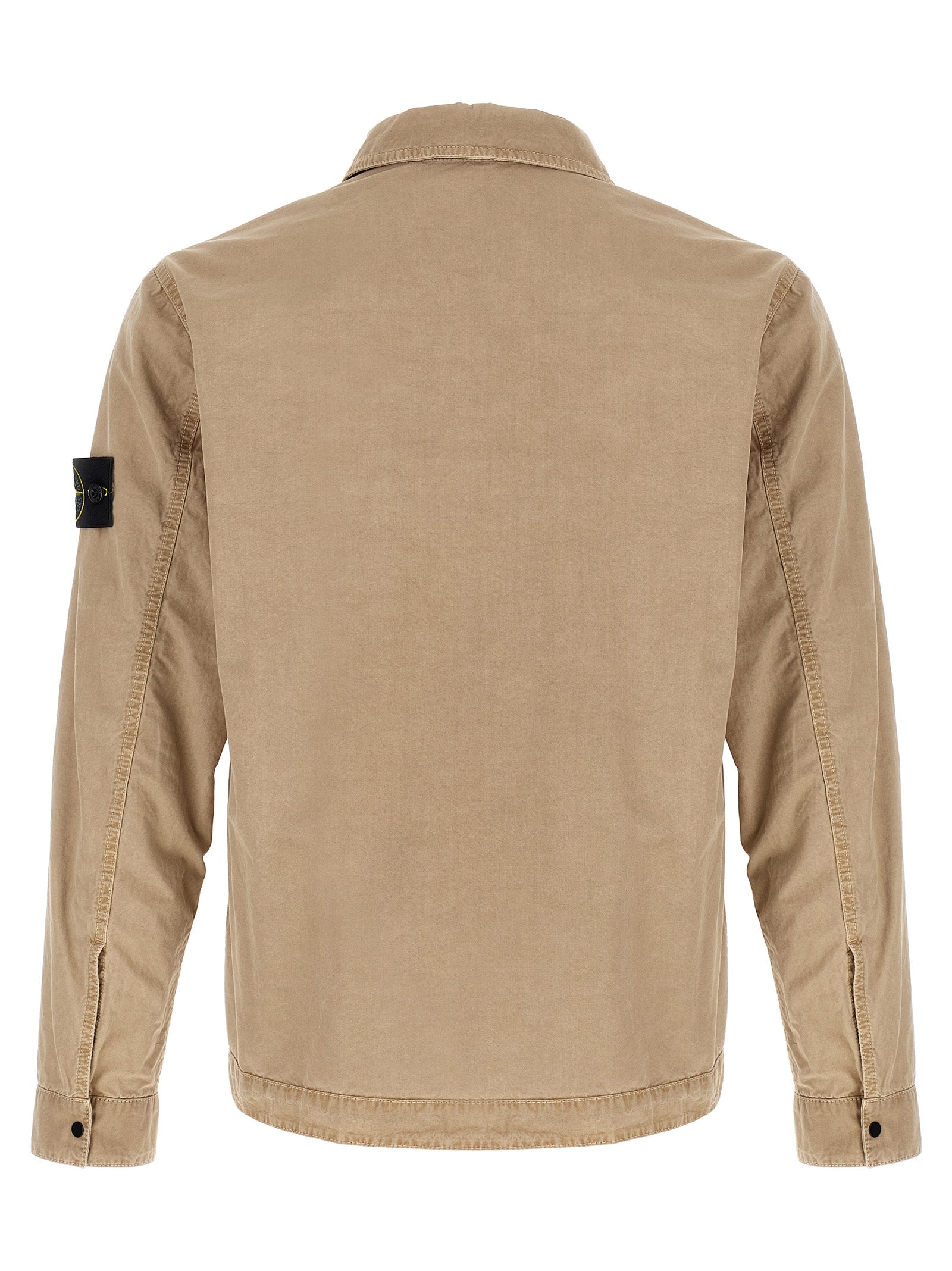 Elevate your wardrobe with the Stone Island Beige Cotton Blouse, a masterpiece of garment-dyed brushed cotton that embodies timeless elegance and sophisticated style.