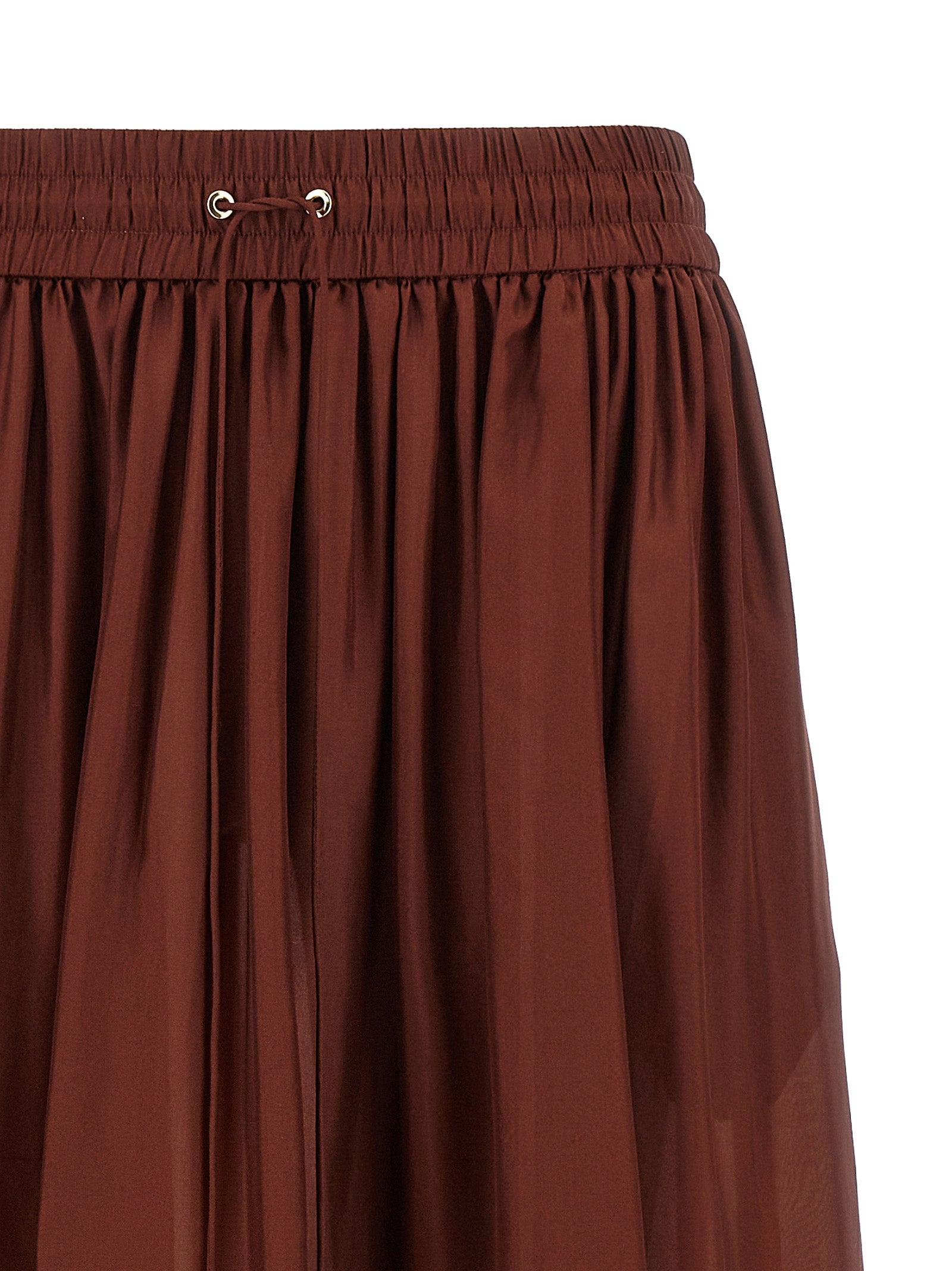 Elevate your elegance with Zimmermann's Bordeaux Silk Mini Skirt, a timeless piece crafted from luxurious silk habotai, perfect for sophisticated occasions.