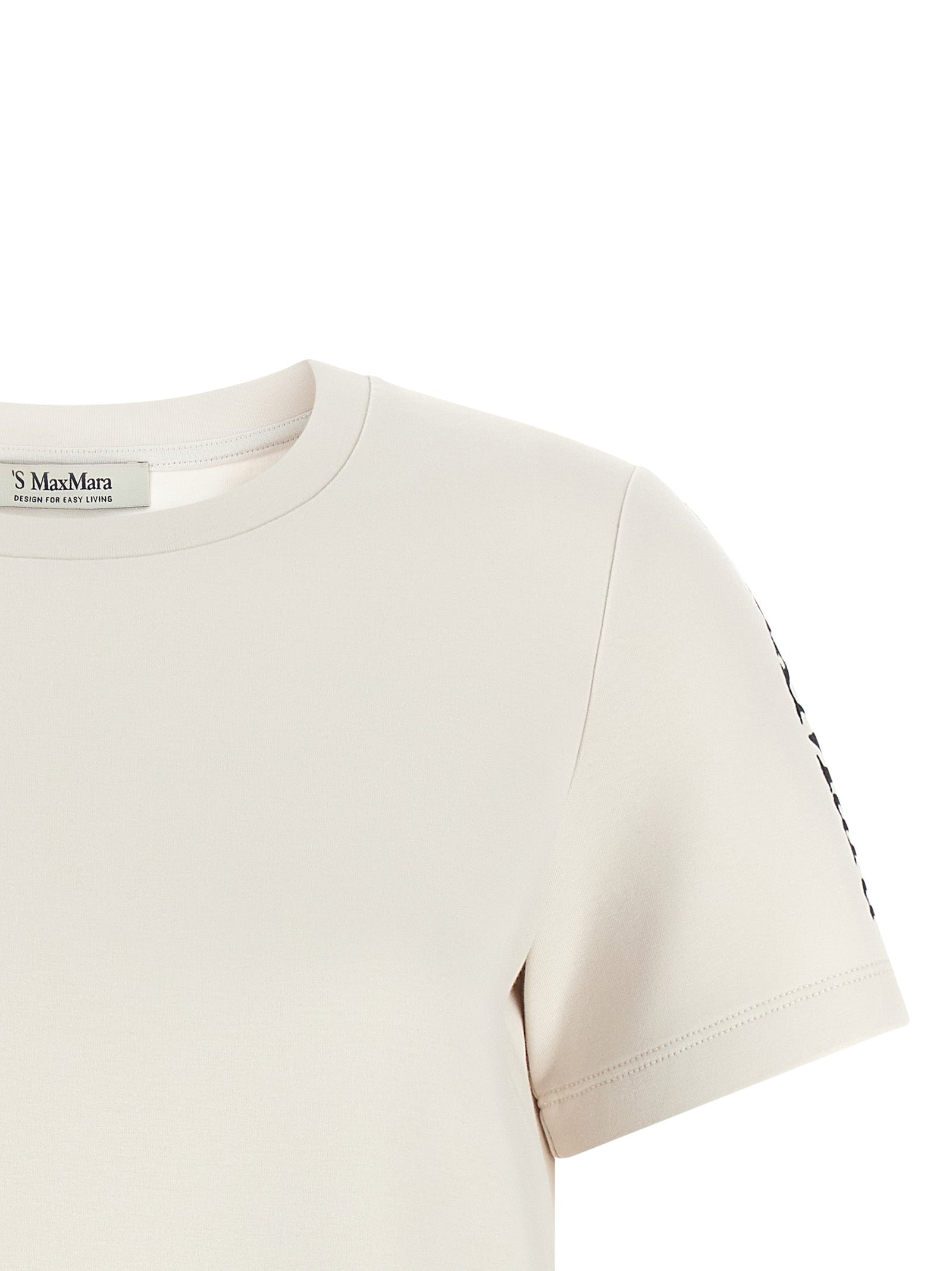 Indulge in the elegance of Max Mara's SmmNancy t-shirt, a luxurious blend of cotton and style, perfect for elevating your everyday wardrobe with refined sophistication.