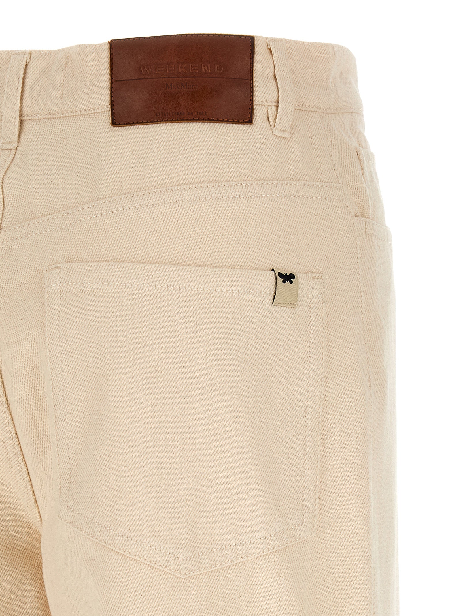Elevate your style with WEEKEND MAX MARA's beige cotton cropped pants, a chic blend of comfort and sophistication, perfect for the modern trendsetter.