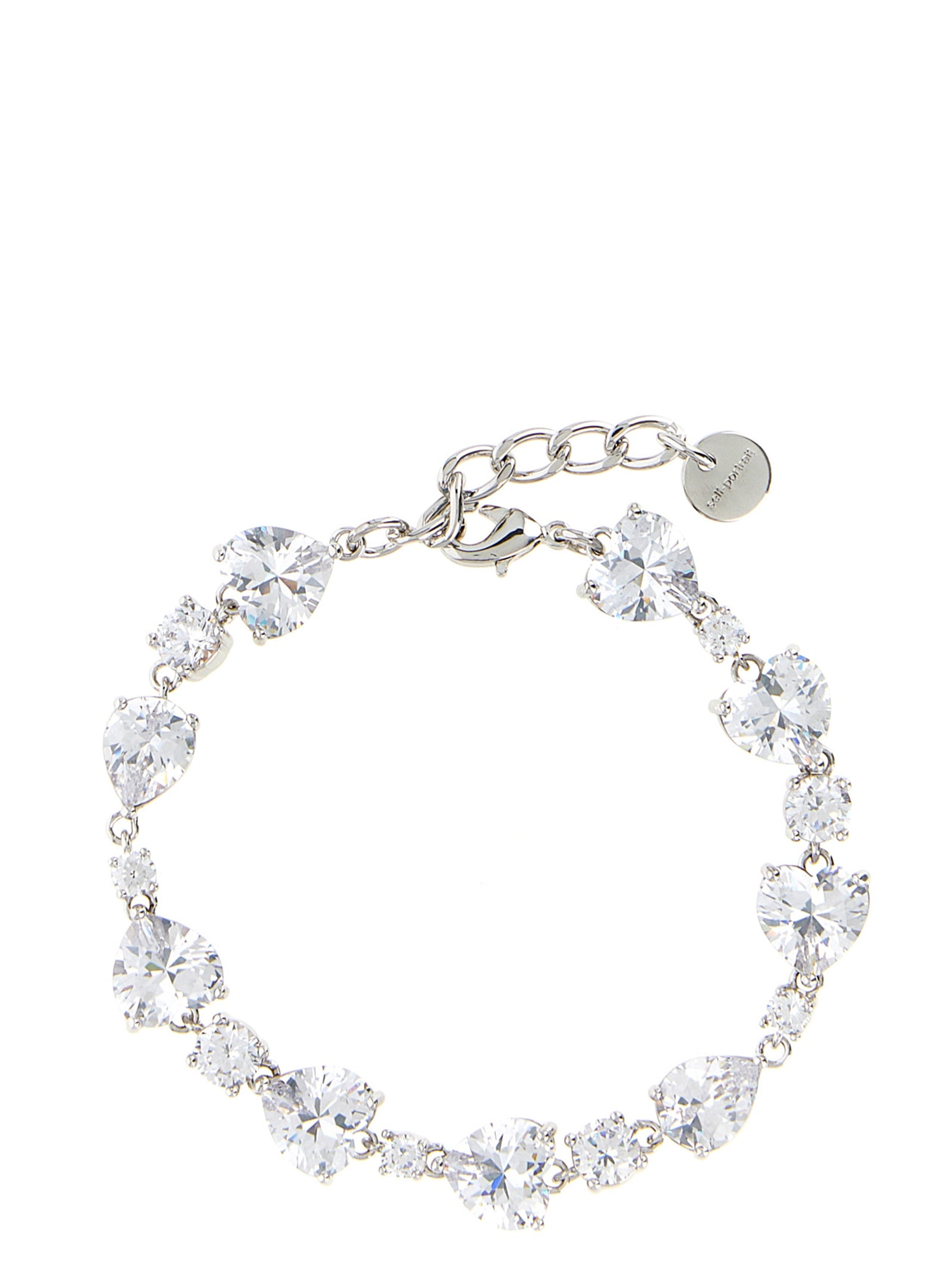 Elevate your elegance with Self-Portrait's Silver Brass Bracelet, a stunning fusion of heart-shaped crystals and exquisite craftsmanship, perfect for the discerning individual.