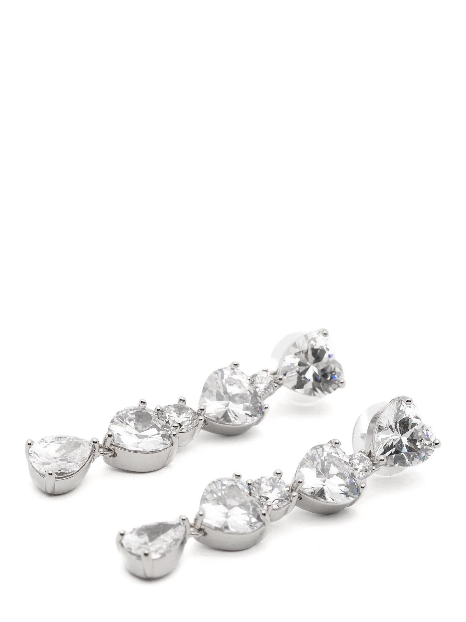 Discover the exquisite Self-Portrait Silver Brass Earrings, where shimmering silver-plated brass meets elegantly shaped heart crystals, embodying modern sophistication and romance.