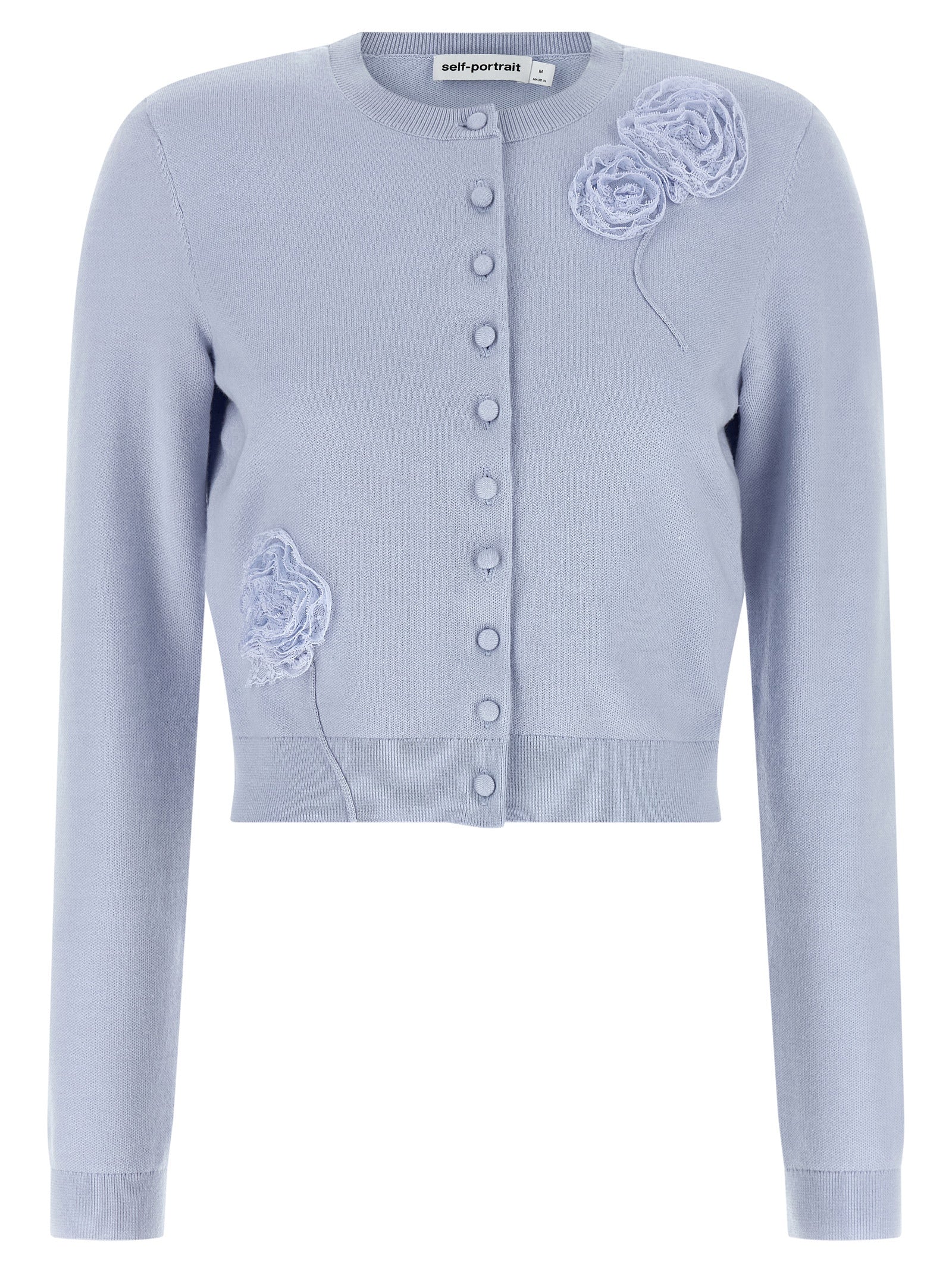 Elevate your style with the Self-Portrait Blue Flower Knit Cardigan, a masterpiece of elegance featuring sculptural lace and luxurious fabric for timeless allure.