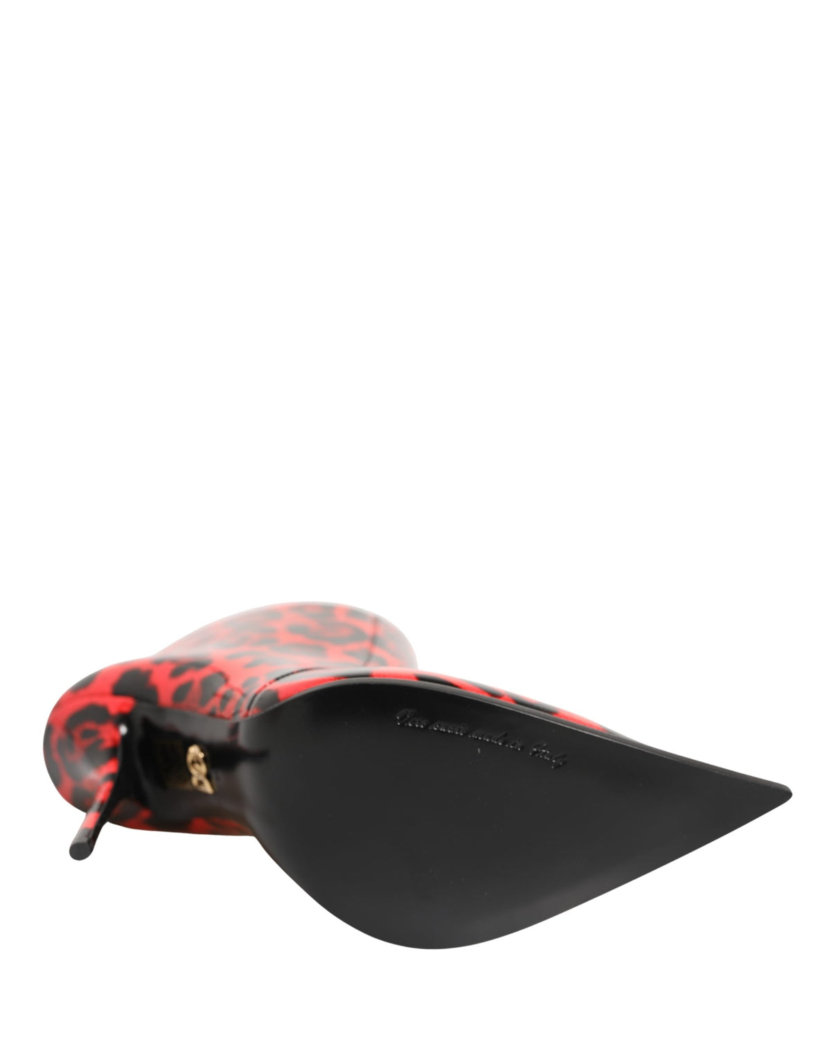 Step into a realm of elegance with Dolce & Gabbana's Red Leopard Cardinale Ankle Boots, crafted from sumptuous calf leather, embodying bold sophistication and timeless allure.