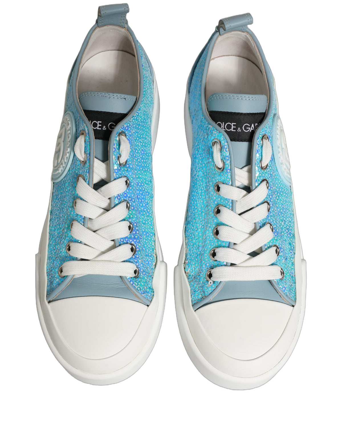 Elevate your style with Dolce & Gabbana's Blue White Sequin Logo Low Top Sneakers, a luxurious blend of Italian craftsmanship and modern elegance, perfect for any occasion.