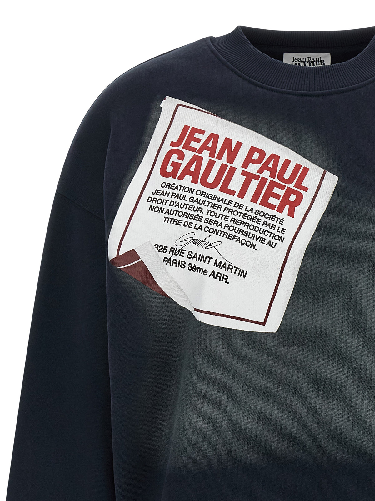 Indulge in the allure of the Jean Paul Gaultier Blue Cotton Sweatshirt, where organic cotton meets iconic design, embodying modern elegance and sustainable luxury.