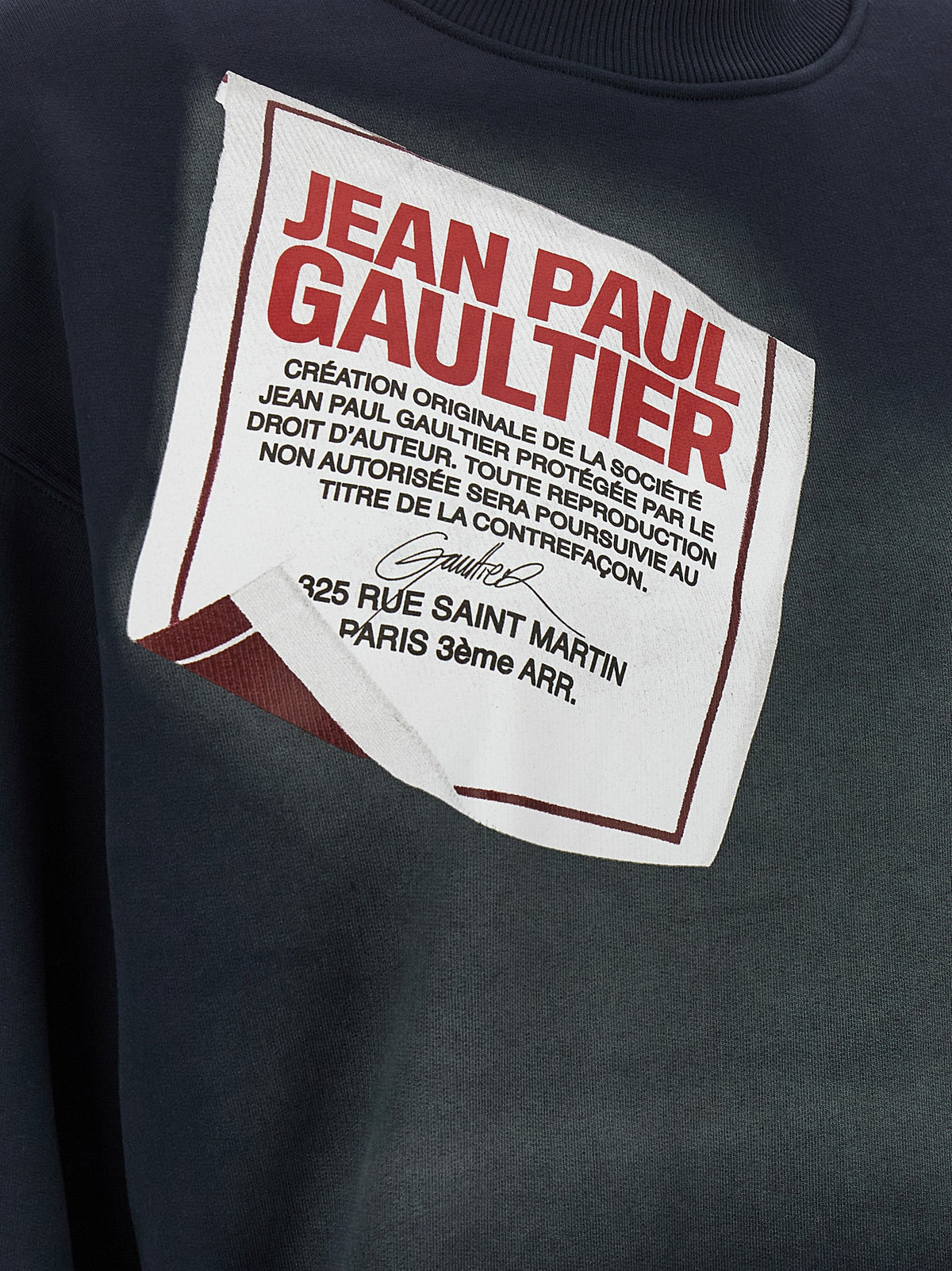 Elevate your wardrobe with the Jean Paul Gaultier Blue Cotton Sweatshirt, a masterpiece of organic cotton, blending modernity and comfort for the discerning fashion connoisseur.