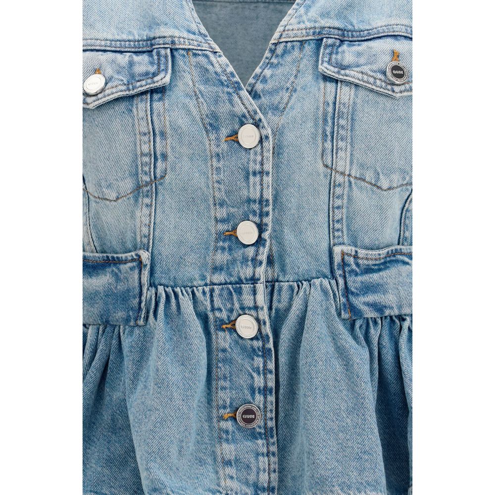 Indulge in the contemporary elegance of the Ganni Blue Cotton Denim Jacket, a lightweight masterpiece that embodies effortless sophistication and versatile style for the discerning individual.