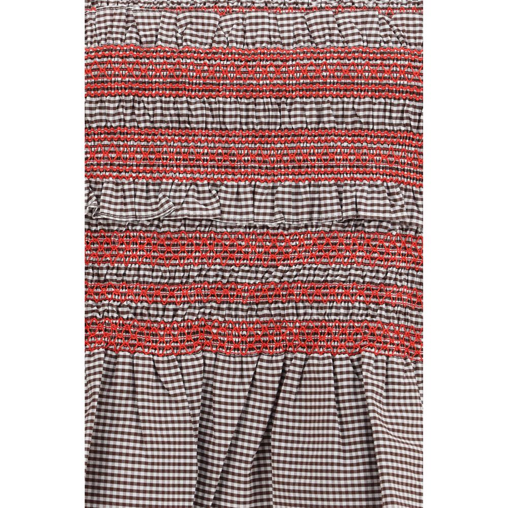 Elevate your wardrobe with Ganni's Brown Cotton Sleeveless T-Shirt, featuring exquisite ruching and elegant side ties for a sophisticated, dynamic silhouette.