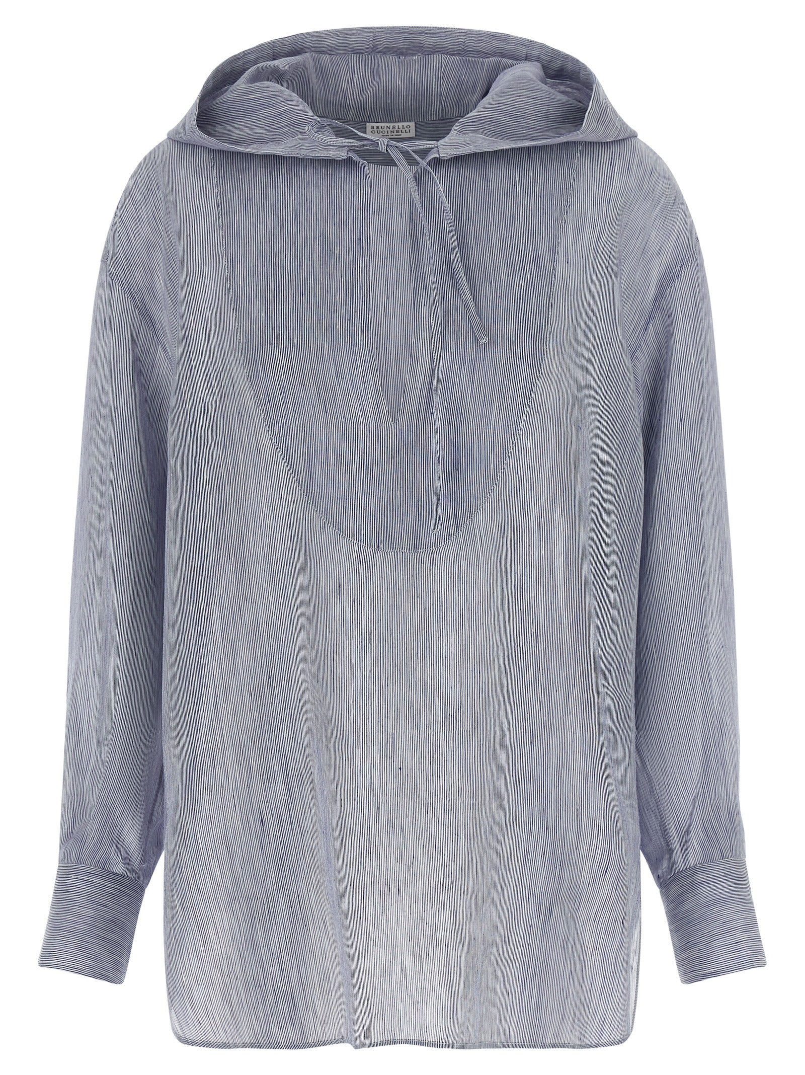 Elevate your wardrobe with the Brunello Cucinelli Blue Linen Blouse, a luxurious blend of linen and silk, embodying modern sophistication and timeless elegance.